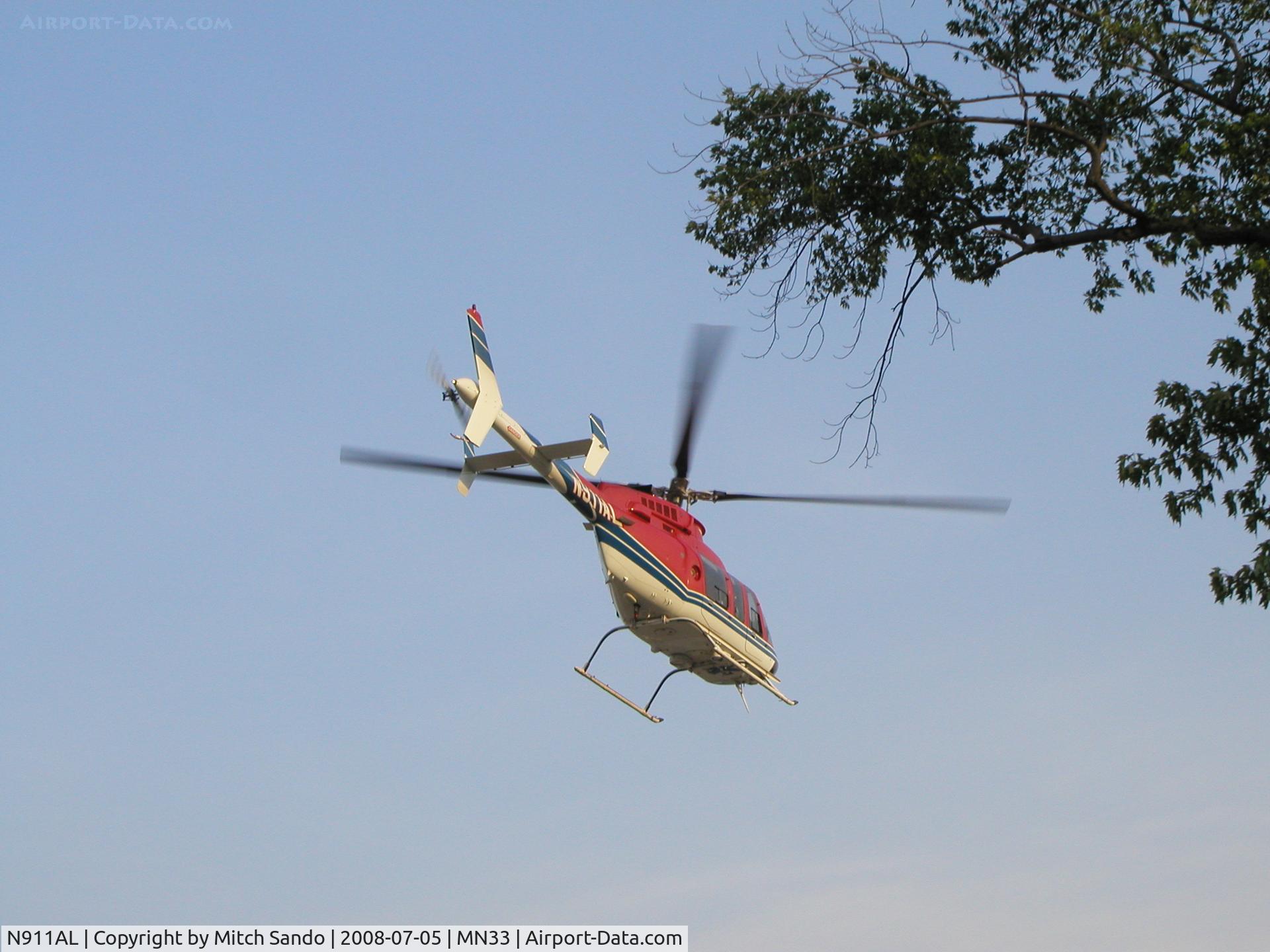 N911AL, 1997 Bell 407 C/N 53144, Life Link 5 departing the Alternate LZ at St. Mary's Duluth enroute VFR to Rice Lake, WI (RPD).