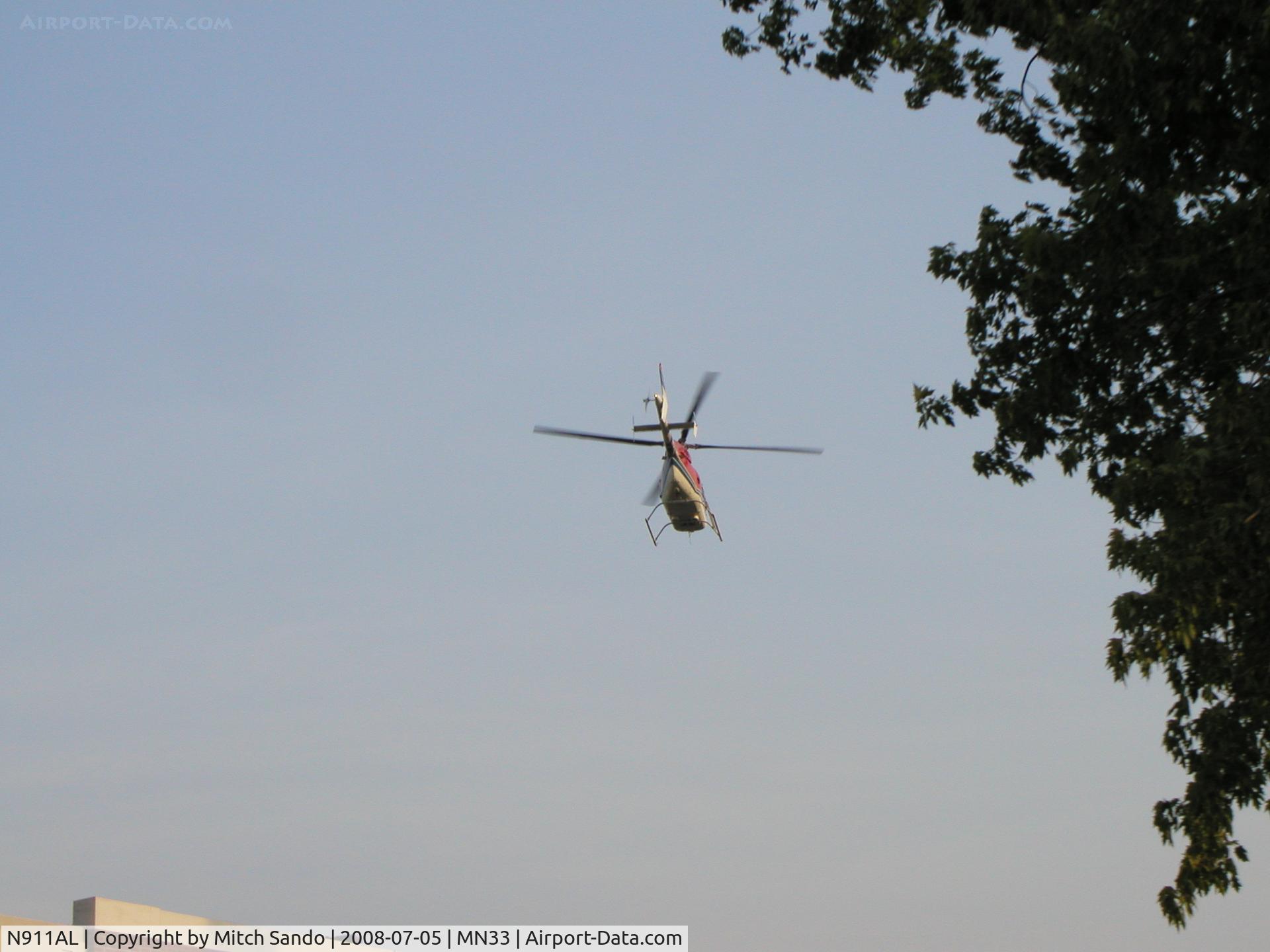 N911AL, 1997 Bell 407 C/N 53144, Life Link 5 departing the Alternate LZ at St. Mary's Duluth enroute VFR to Rice Lake, WI (RPD).