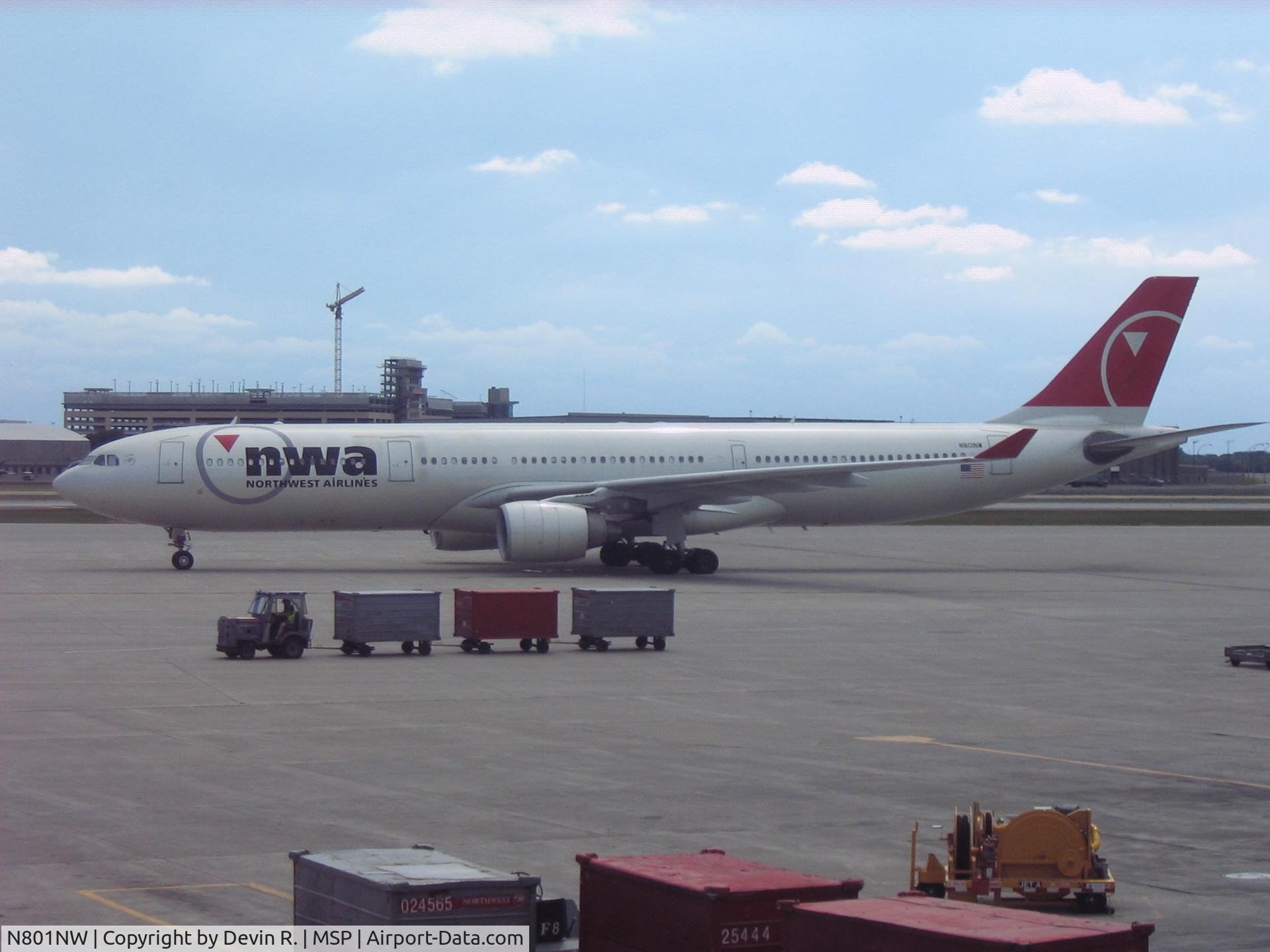 N801NW, 2003 Airbus A330-323 C/N 0524, Waiting to turn into its gate