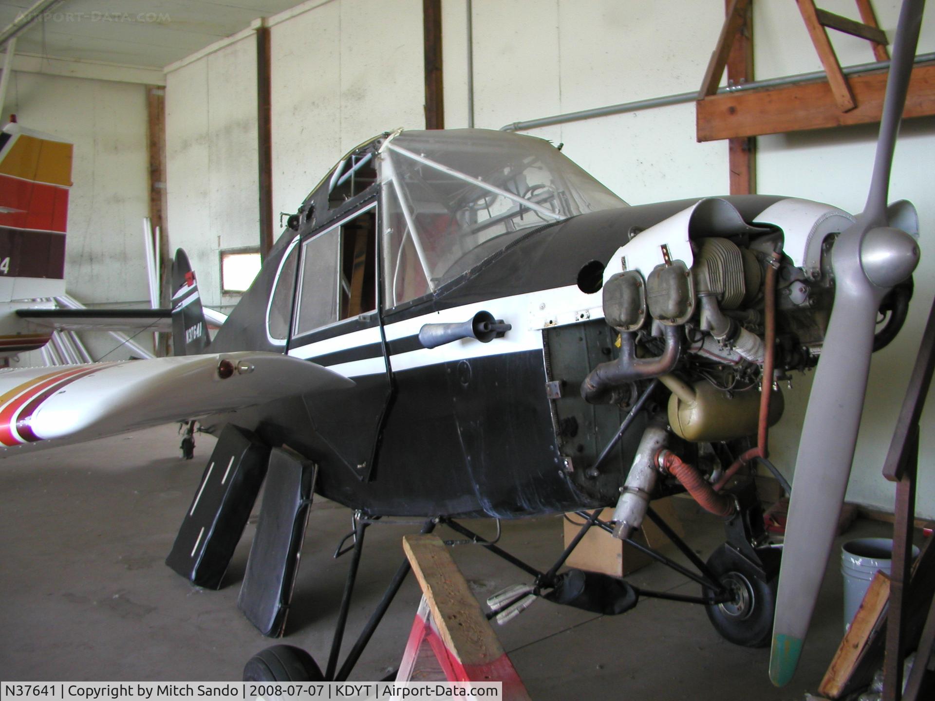 N37641, 1955 Piper J5A Cub Cruiser C/N 5-178, Parked inside the hangar.