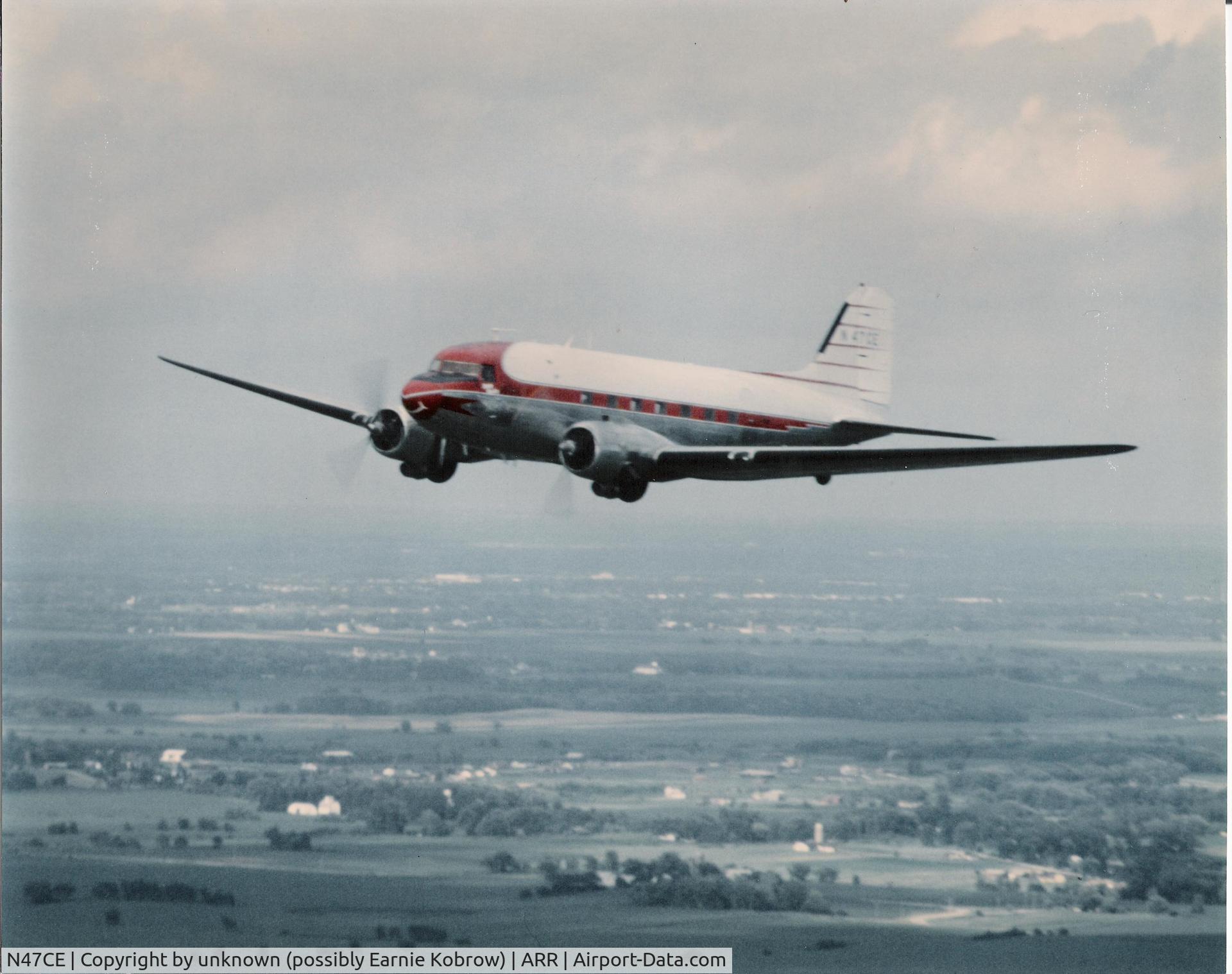 N47CE, 1944 Douglas DC3C-S1C3G (C-47A) C/N 13456, N47CE in flight circa 1987