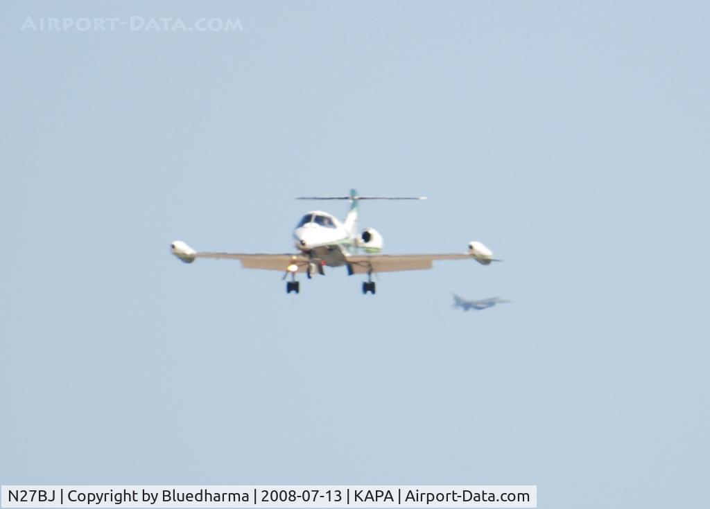 N27BJ, 1971 Learjet 24B C/N 227, On approach to 17L. A F-16 in the distance flys by.