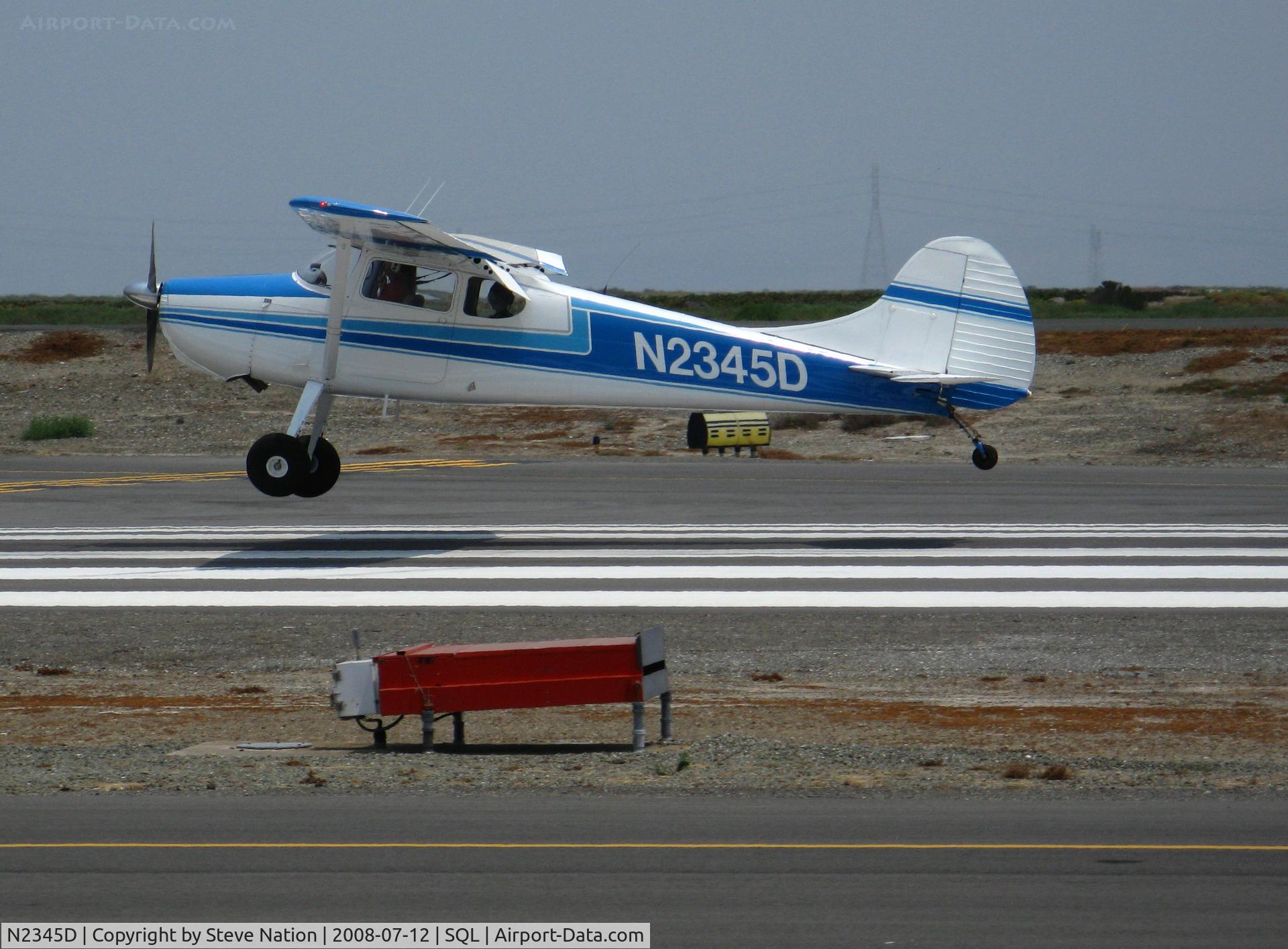 N2345D, 1952 Cessna 170B C/N 20497, 1952 Cessna 170B touching down in smoky conditions @ San Carlos, CA