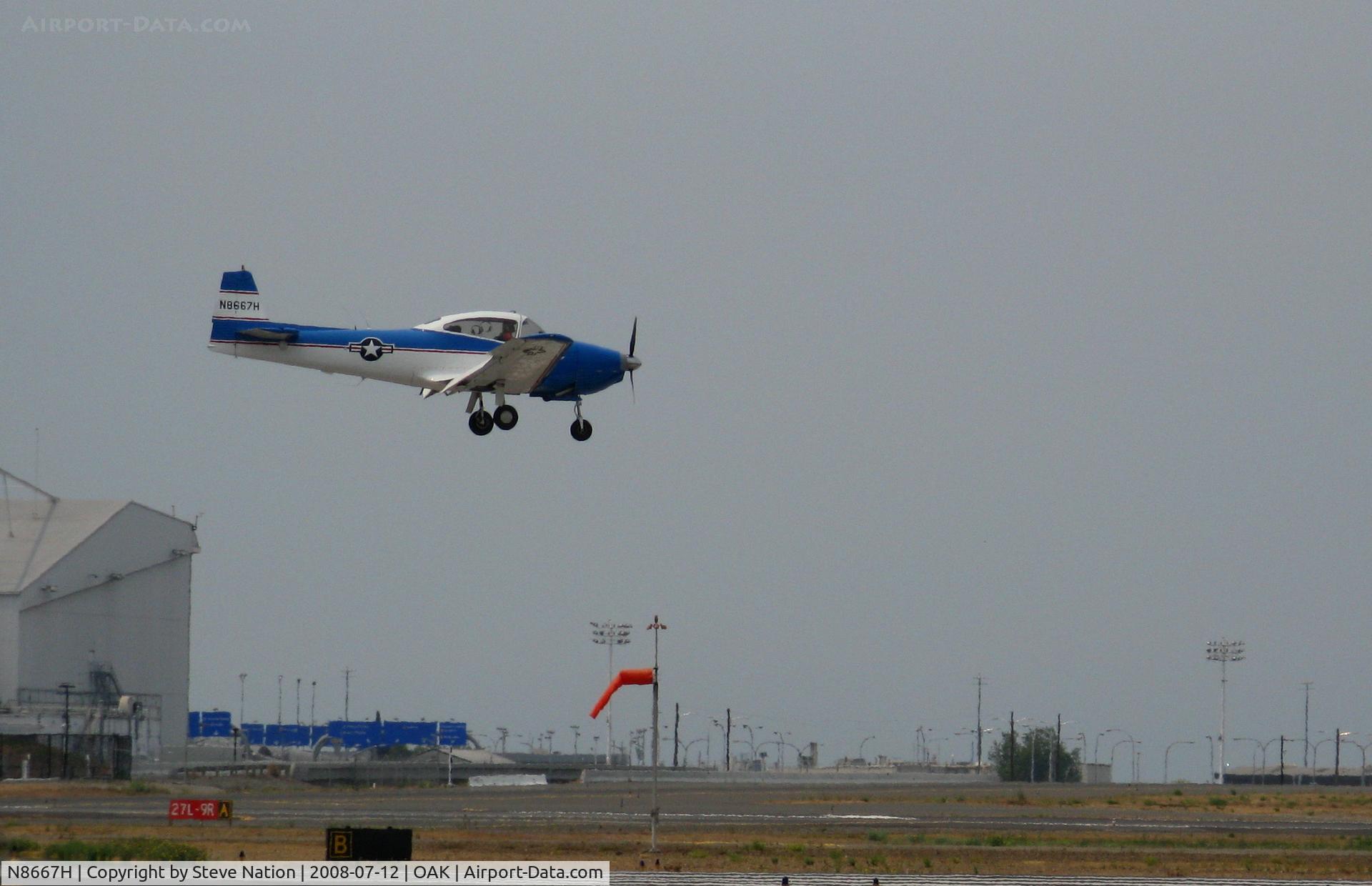 N8667H, 1947 North American Navion C/N NAV-4-667, pseudo-USAF 1947 North American Navion landing in smoky conditions @ Oakland, CA