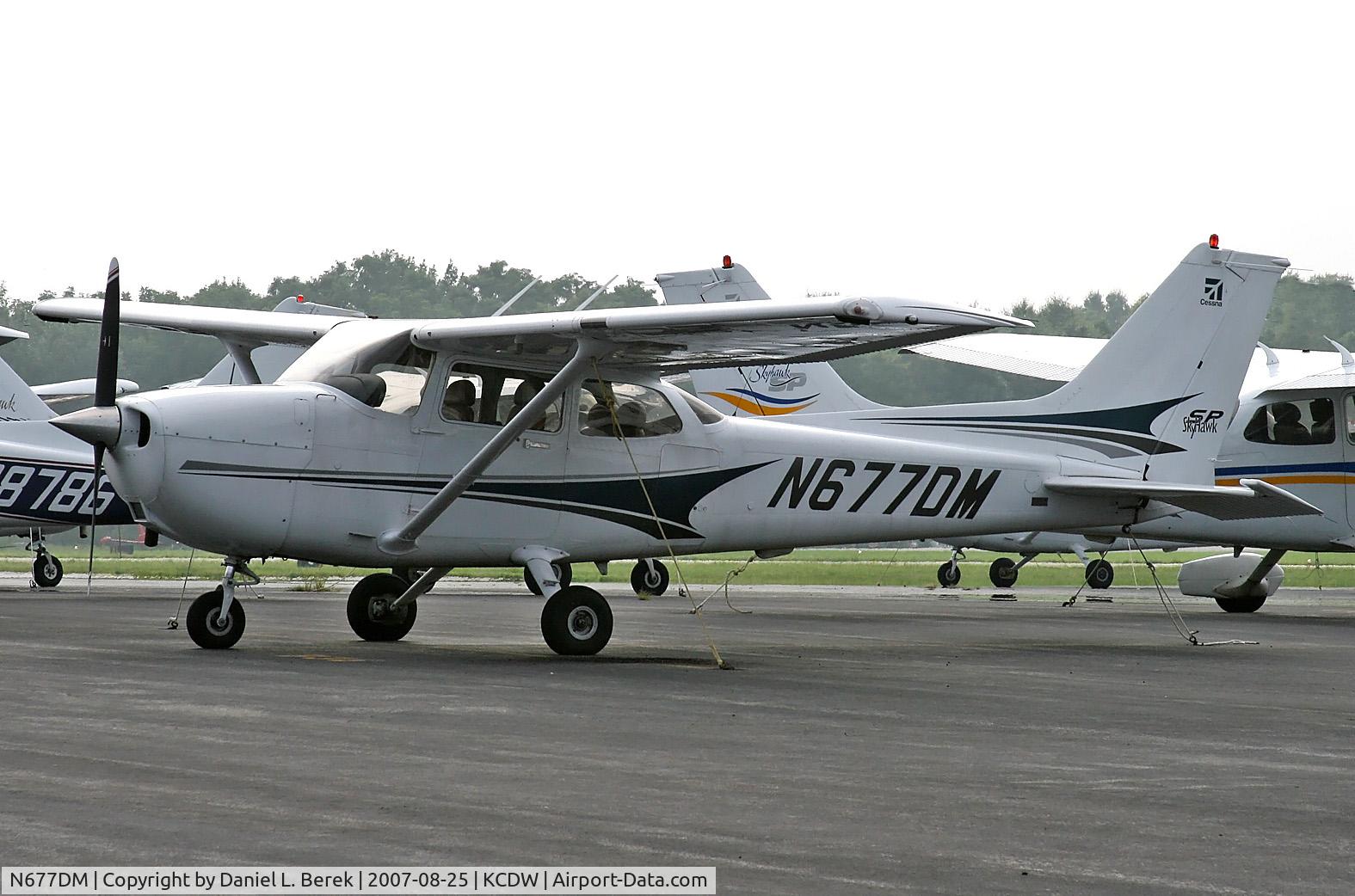 N677DM, 2004 Cessna 172S C/N 172S9661, A sharp-looking Skyhawk SP joins the crowd at Caldwell.