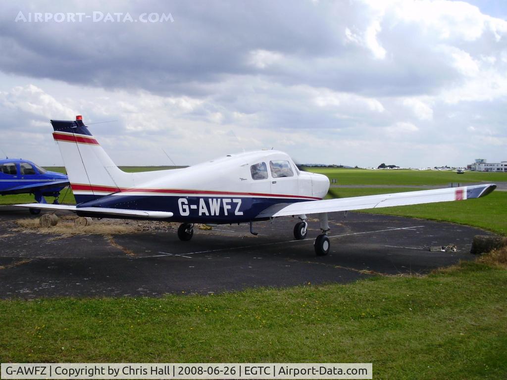 G-AWFZ, 1968 Beech A23-19 Musketeer Sport III C/N MB-323, tied down next to G-ERIC