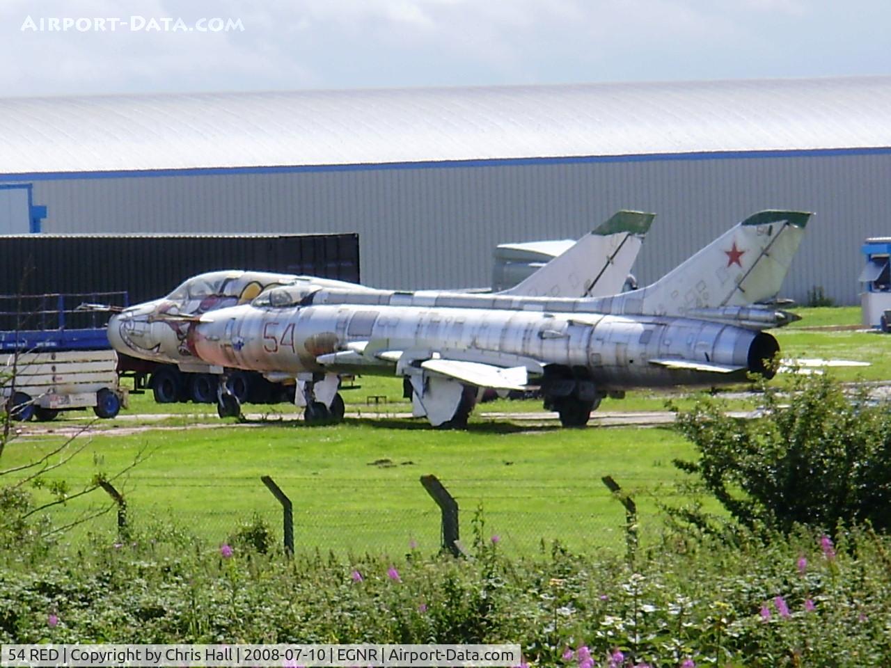 54 RED, Sukhoi Su-17M C/N 69004, Sukhoi Su-17M fitter with 35 red behind it