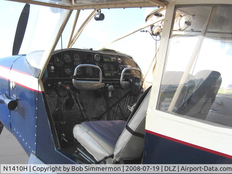 N1410H, 1949 Aeronca 15AC Sedan C/N 15AC-462, Left side door swings up and the right side swings forward.  It was built with metal wings and has float fittings.