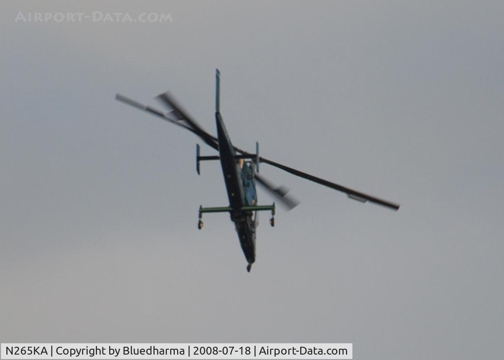 N265KA, 2004 Kaman K-1200 K-Max C/N A94-0035, Flying over Columbine High School, Littleton Colorado