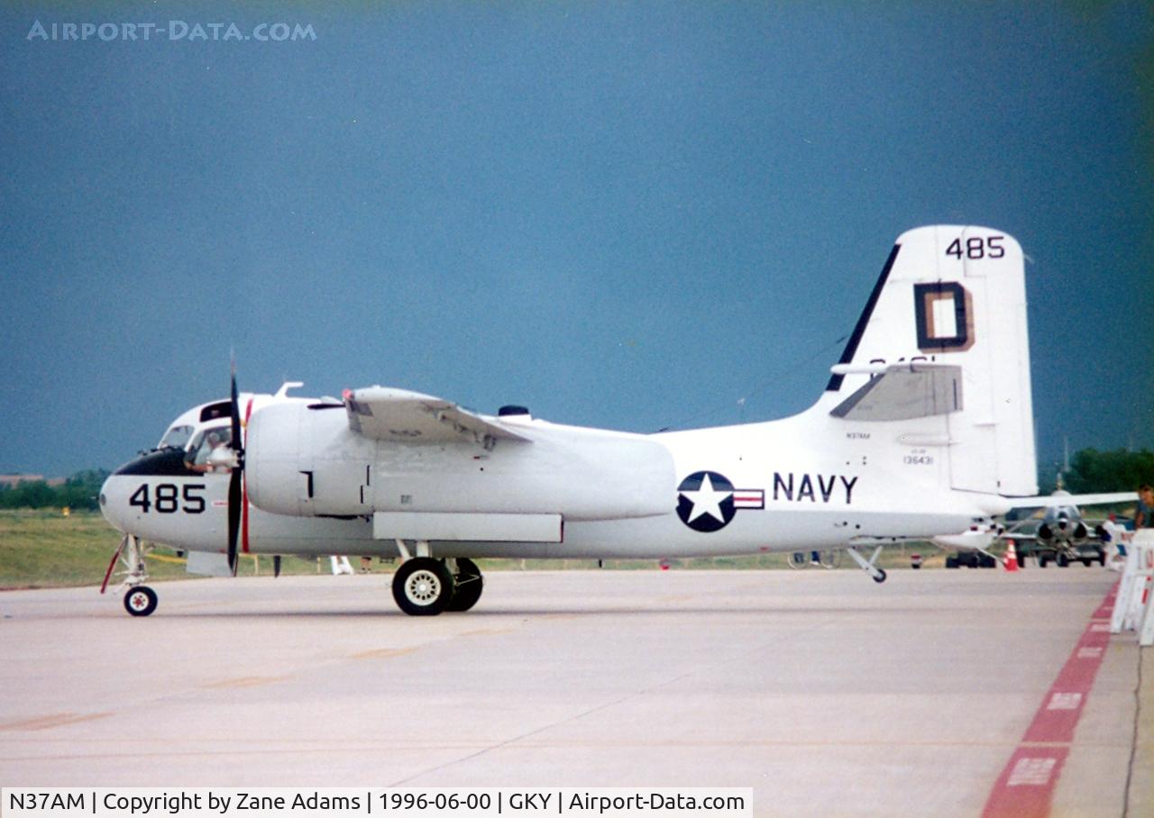N37AM, 1959 Grumman US-2B Tracker (G89) C/N 340, Approaching storms causes a fast departure from Arlington Municipal Open House