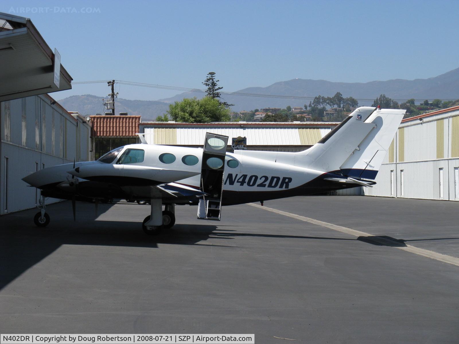 N402DR, 1967 Cessna 402 C/N 402-0047, 1967 Cessna 402, two Continental TSIO-520-VBs 325 Hp each, airstair door open, cargo door closed