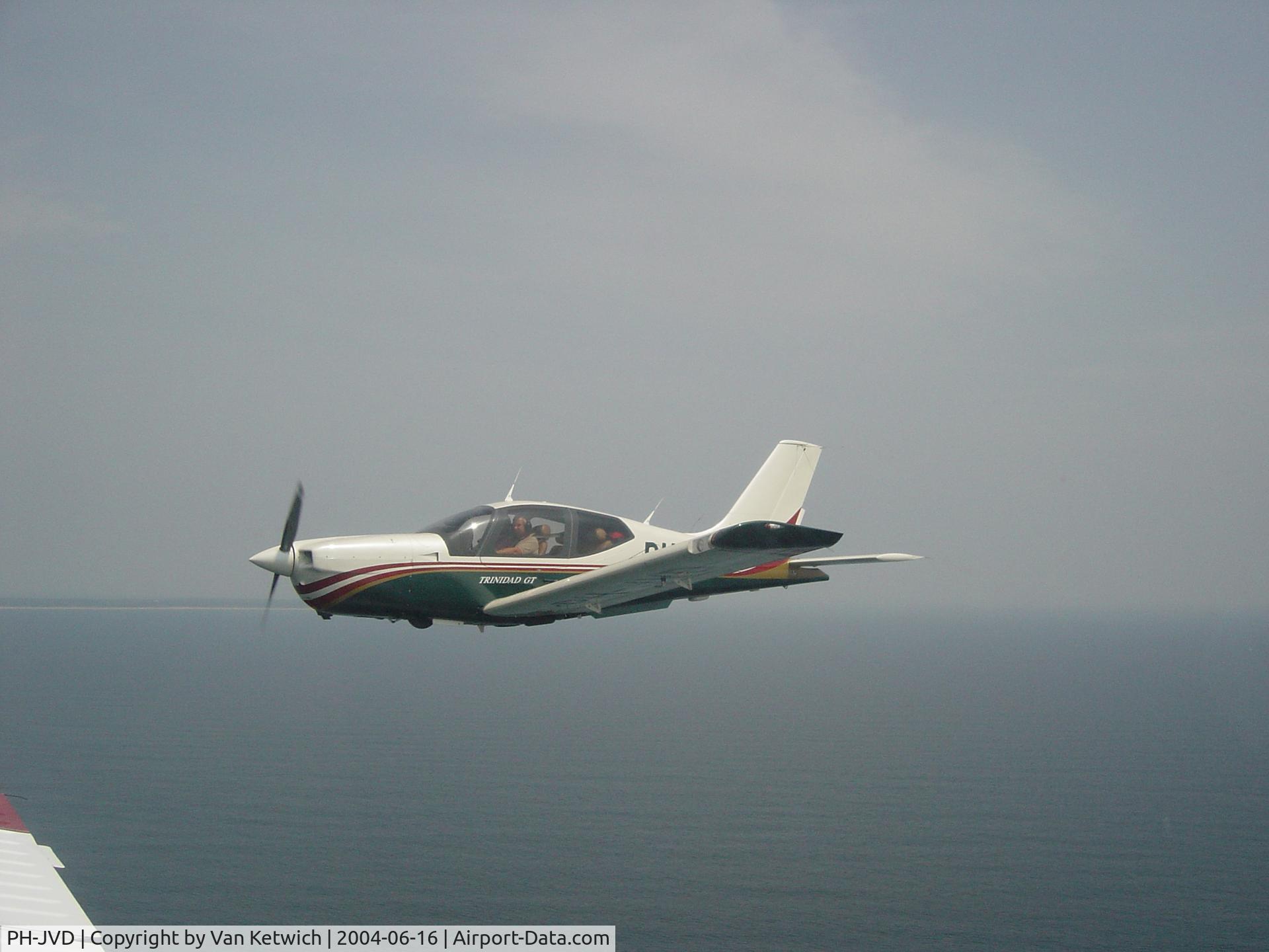 PH-JVD, Socata TB-20 GA C/N 2052, Over the Atlantic. French coast in background