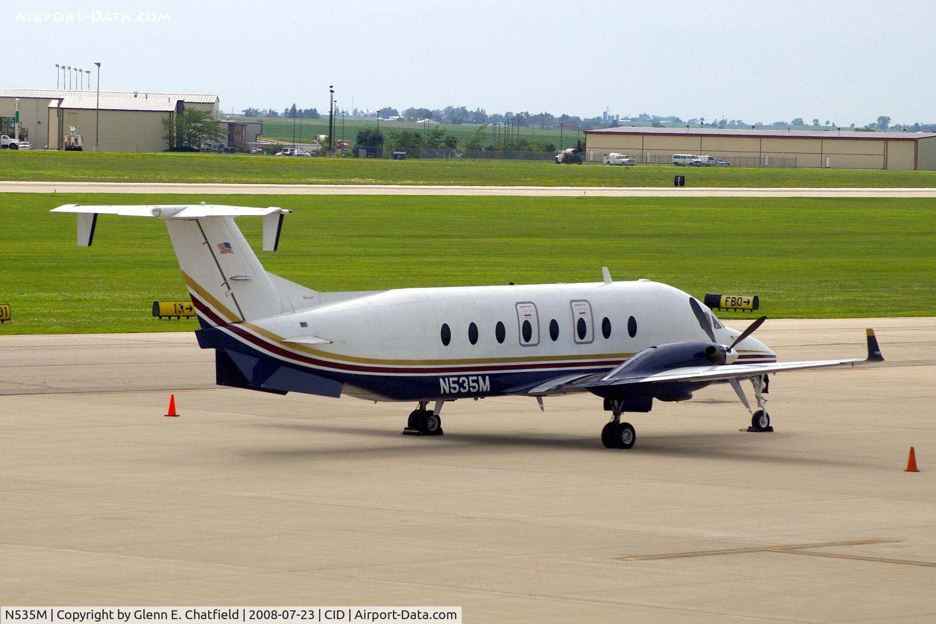 N535M, 1998 Raytheon Aircraft Company 1900D C/N UE-332, Parked on the Landmark Ramp, as seen from my office in the tower.