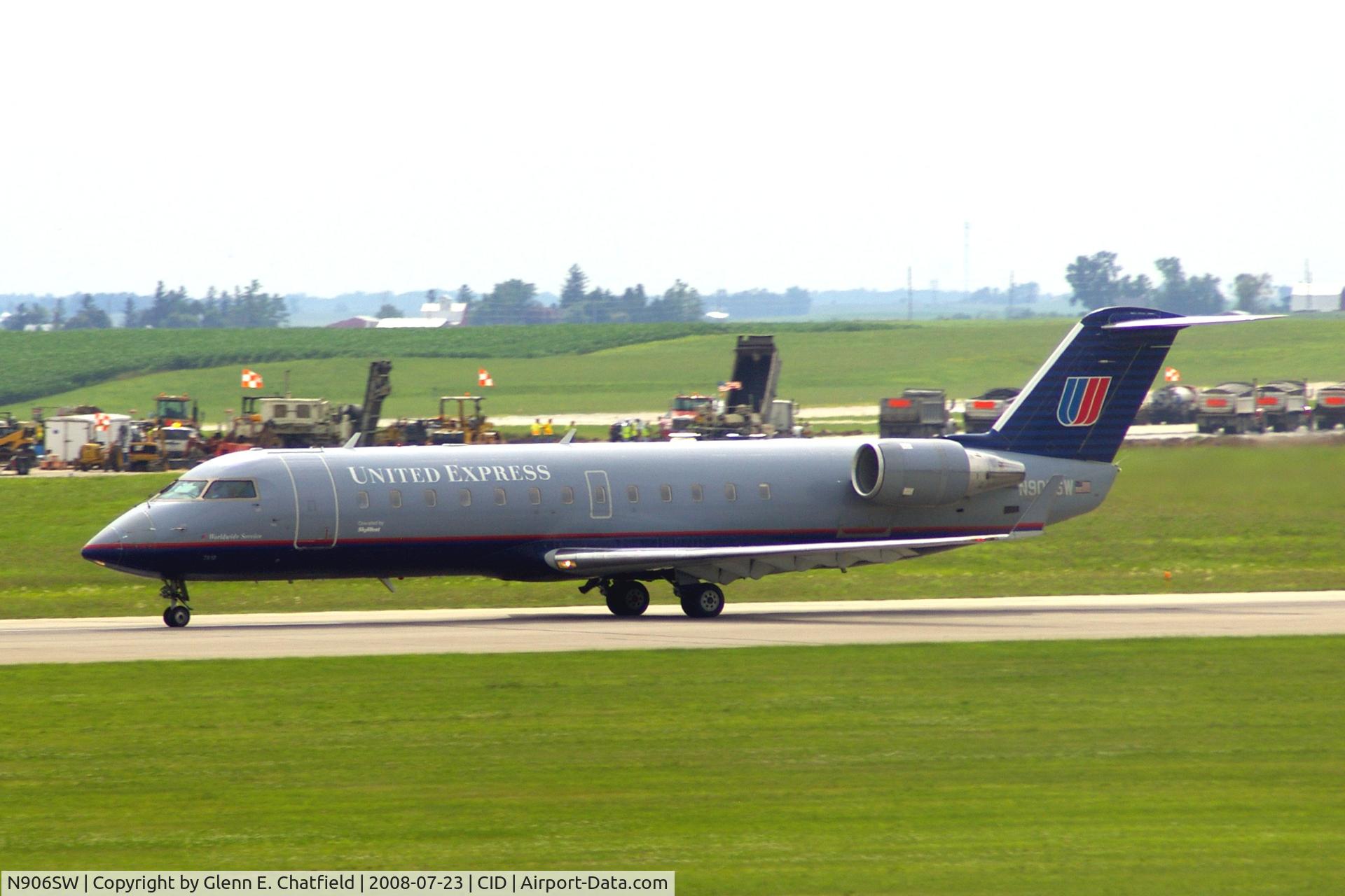 N906SW, 2001 Bombardier CRJ-200LR (CL-600-2B19) C/N 7510, Seen from my office window, departing runway 13