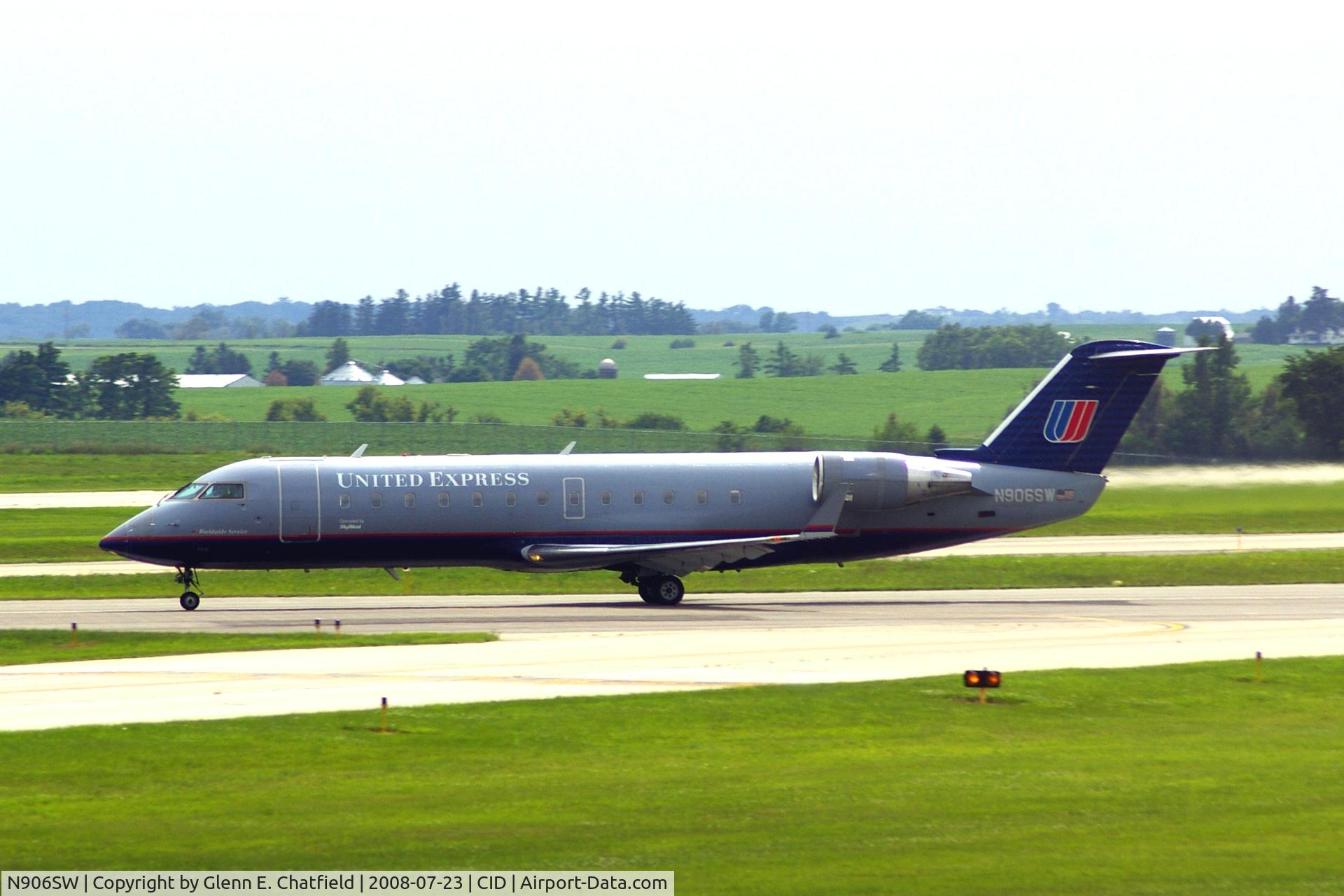 N906SW, 2001 Bombardier CRJ-200LR (CL-600-2B19) C/N 7510, Seen from my office window, departing runway 13