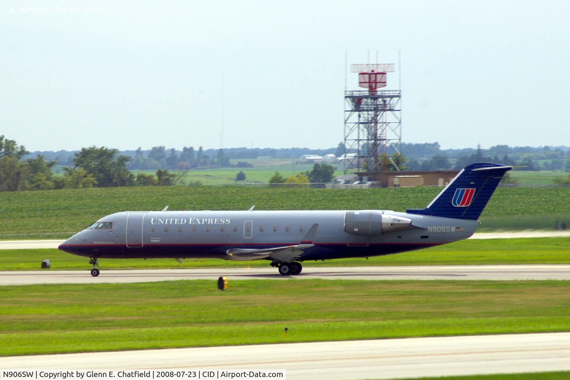 N906SW, 2001 Bombardier CRJ-200LR (CL-600-2B19) C/N 7510, Seen from my office window, departing runway 13