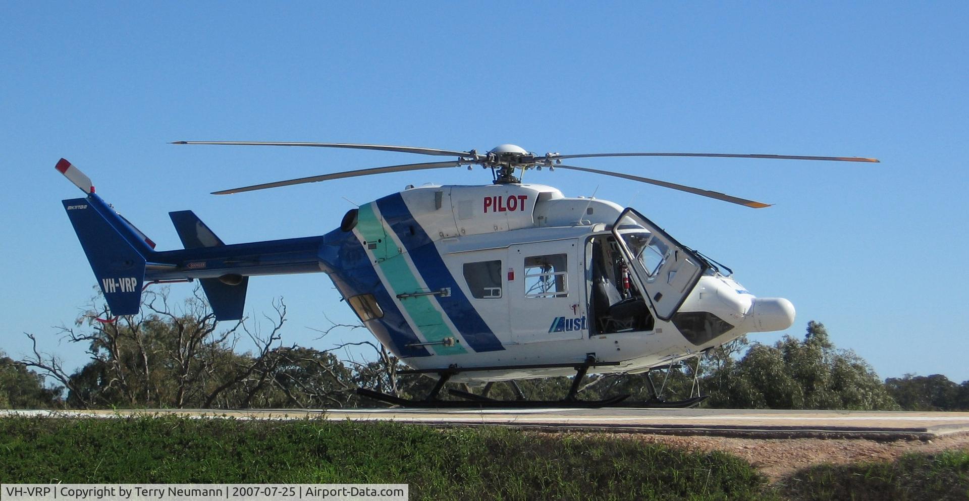 VH-VRP, 1990 MBB-Kawasaki BK-117B-2 C/N 1057, Waiting on the Balaklava (South Australia) Hospital helipad during a medivac flight