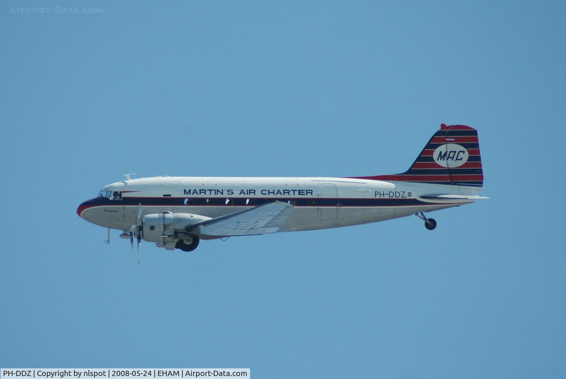 PH-DDZ, 1943 Douglas DC-3C-S1C3G (C-47A) C/N 19754, Flying in old Martinair colours.