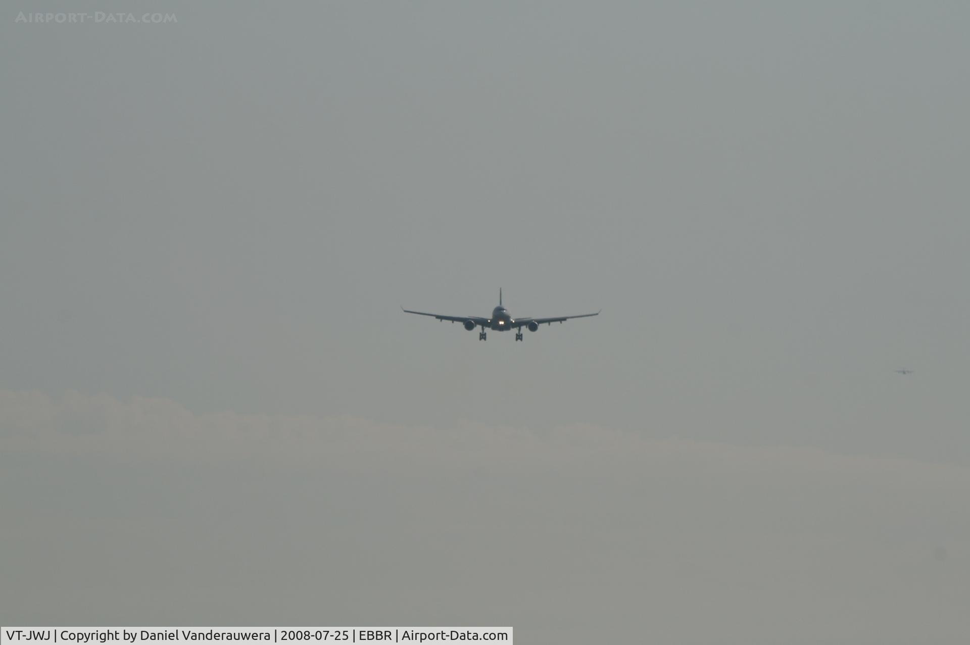 VT-JWJ, 2007 Airbus A330-203 C/N 885, in approach to rwy 25L , followed by ARJ-85 reg. OO-DJN