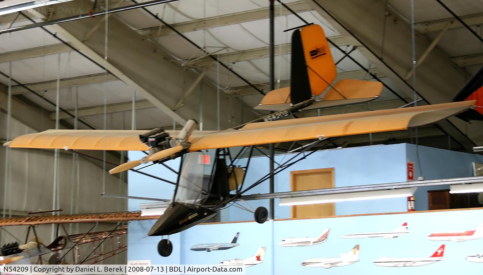 N54209, Pioneer Flightstar MC C/N MC 658, This neat little homebuilt aircraft flies among the rafters at the New England Air Museum.