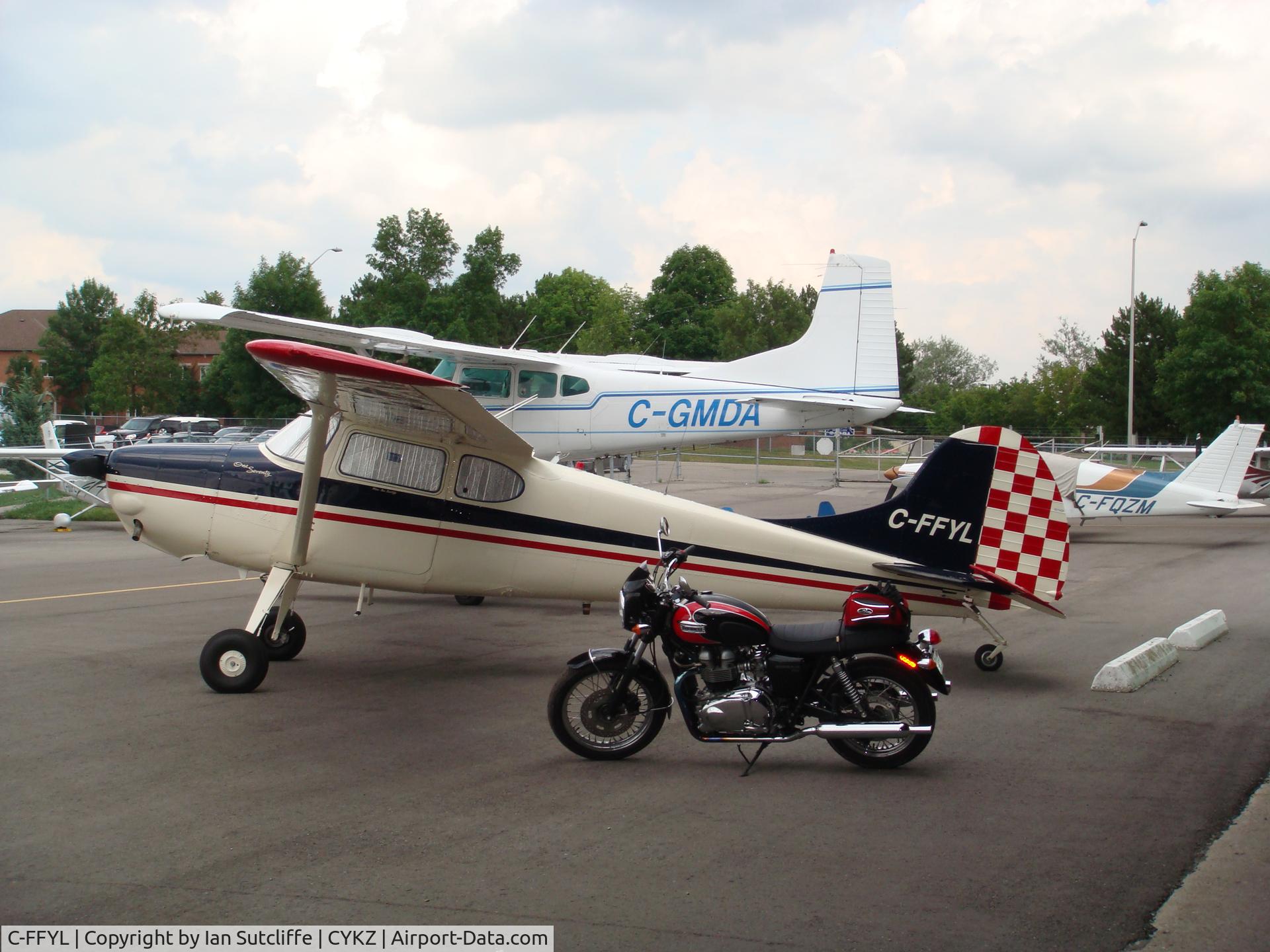C-FFYL, 1952 Cessna 170B C/N 25270, Fresh Paint on Ramp at Buttonville (Truimph Bonneville in Foreground)