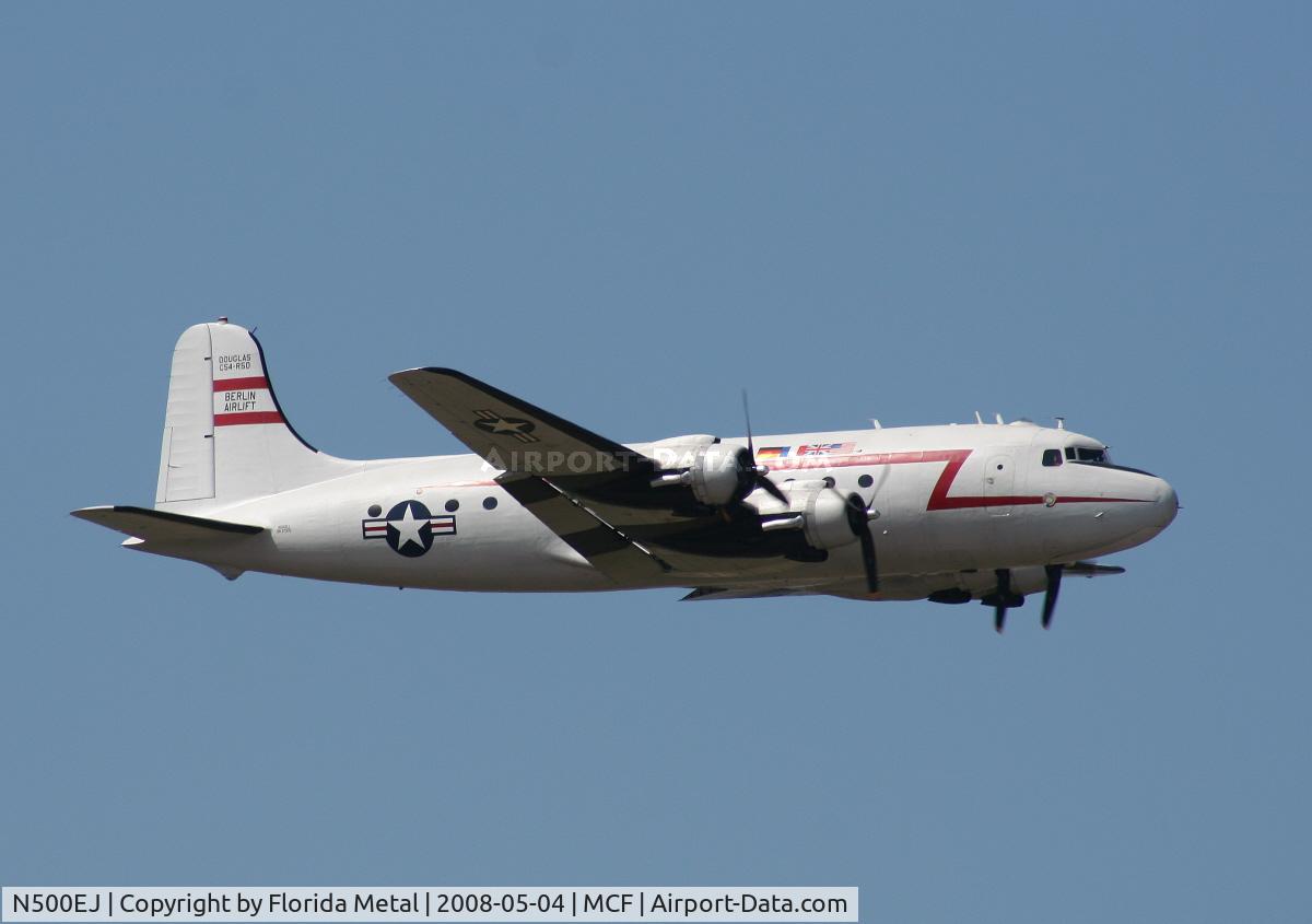 N500EJ, 1945 Douglas C-54E Skymaster (DC-4A) C/N DO316, Doing a fly by dropping little candy parachutes
