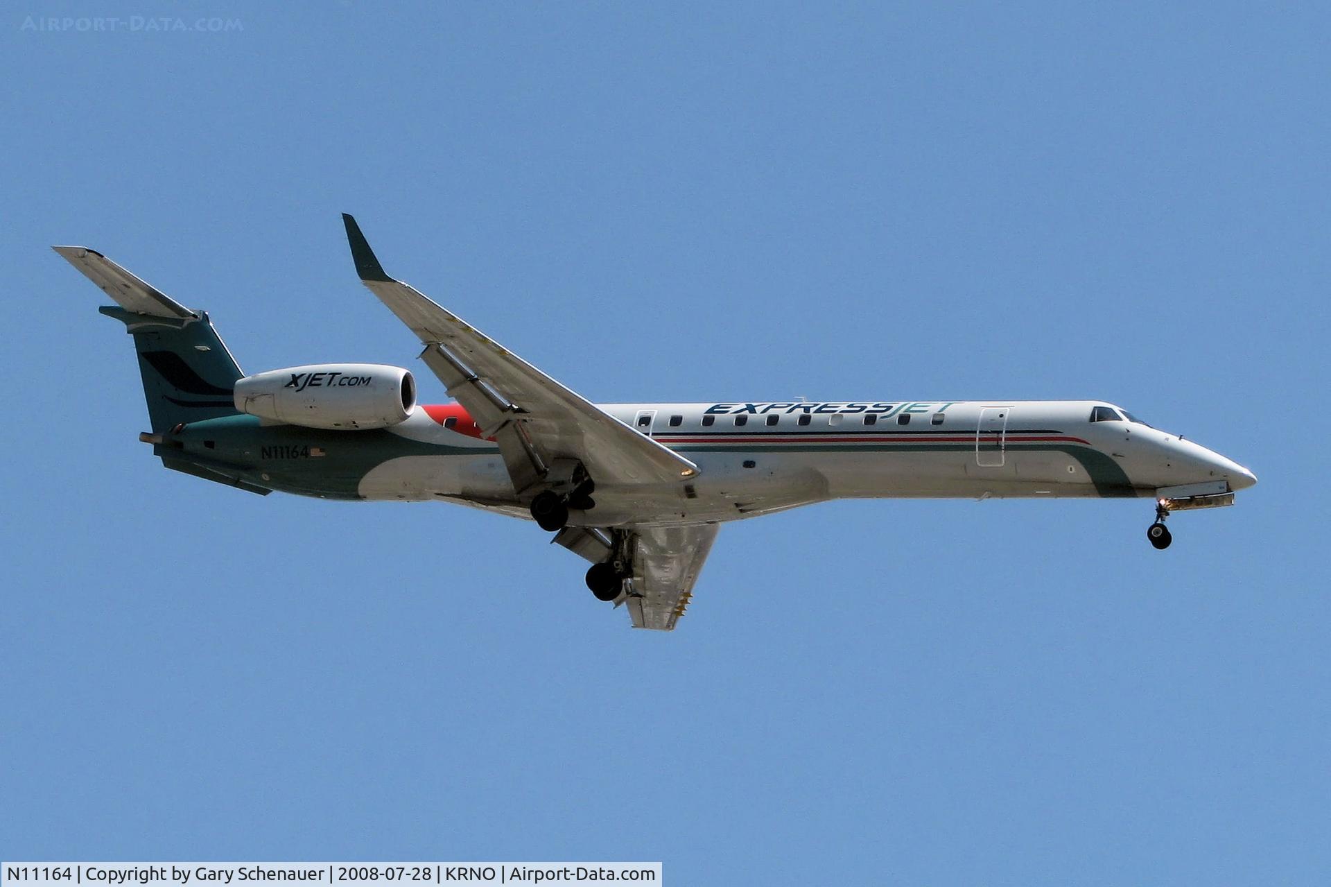 N11164, 2004 Embraer ERJ-145XR (EMB-145XR) C/N 14500817, On final to KRNO's runway 16R, arriving about 25 minutes before another company Embraer (see N11194).