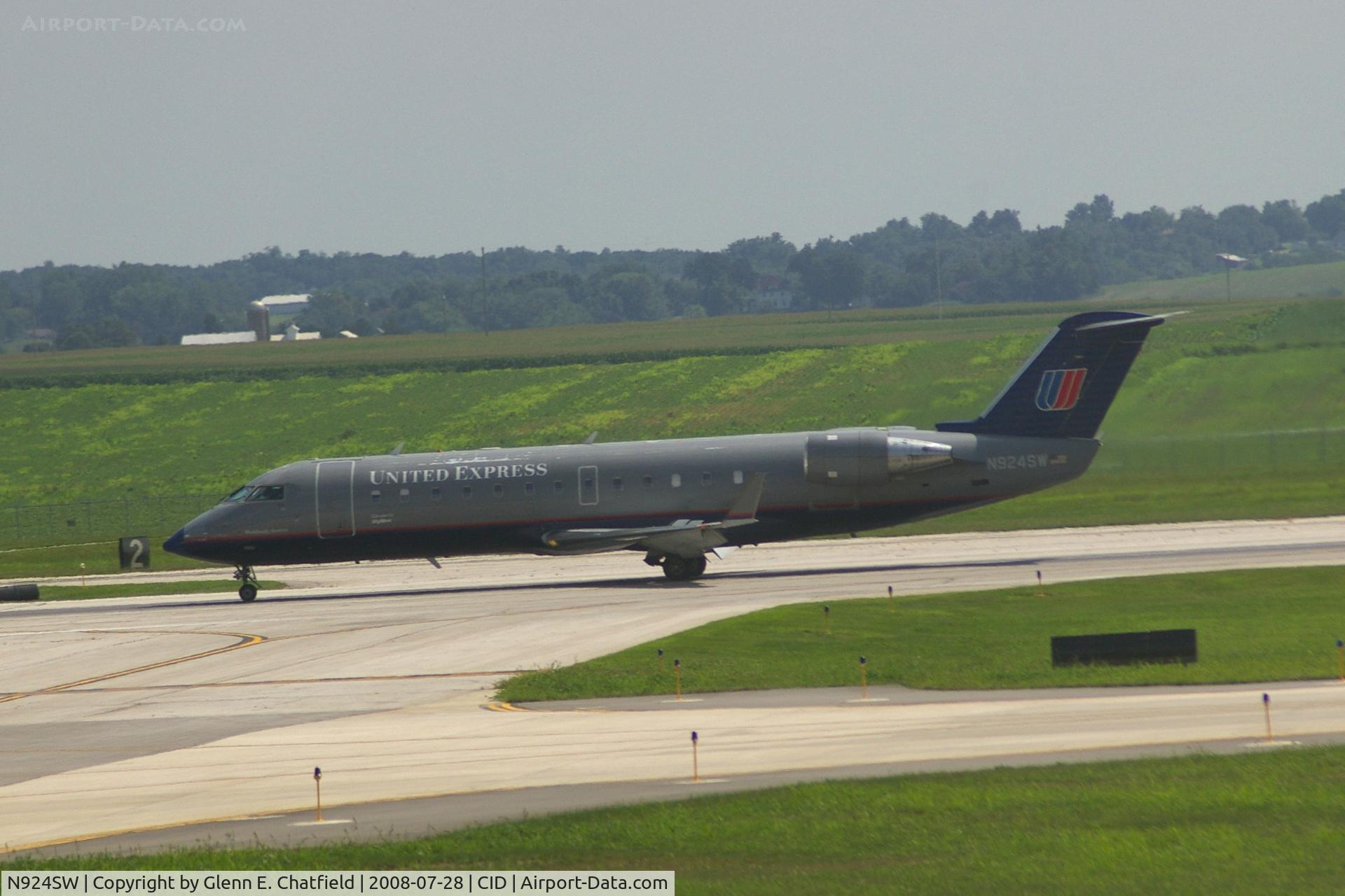 N924SW, 2002 Bombardier CRJ-200LR (CL-600-2B19) C/N 7681, Rolling out on Runway 9, seen from my office window.