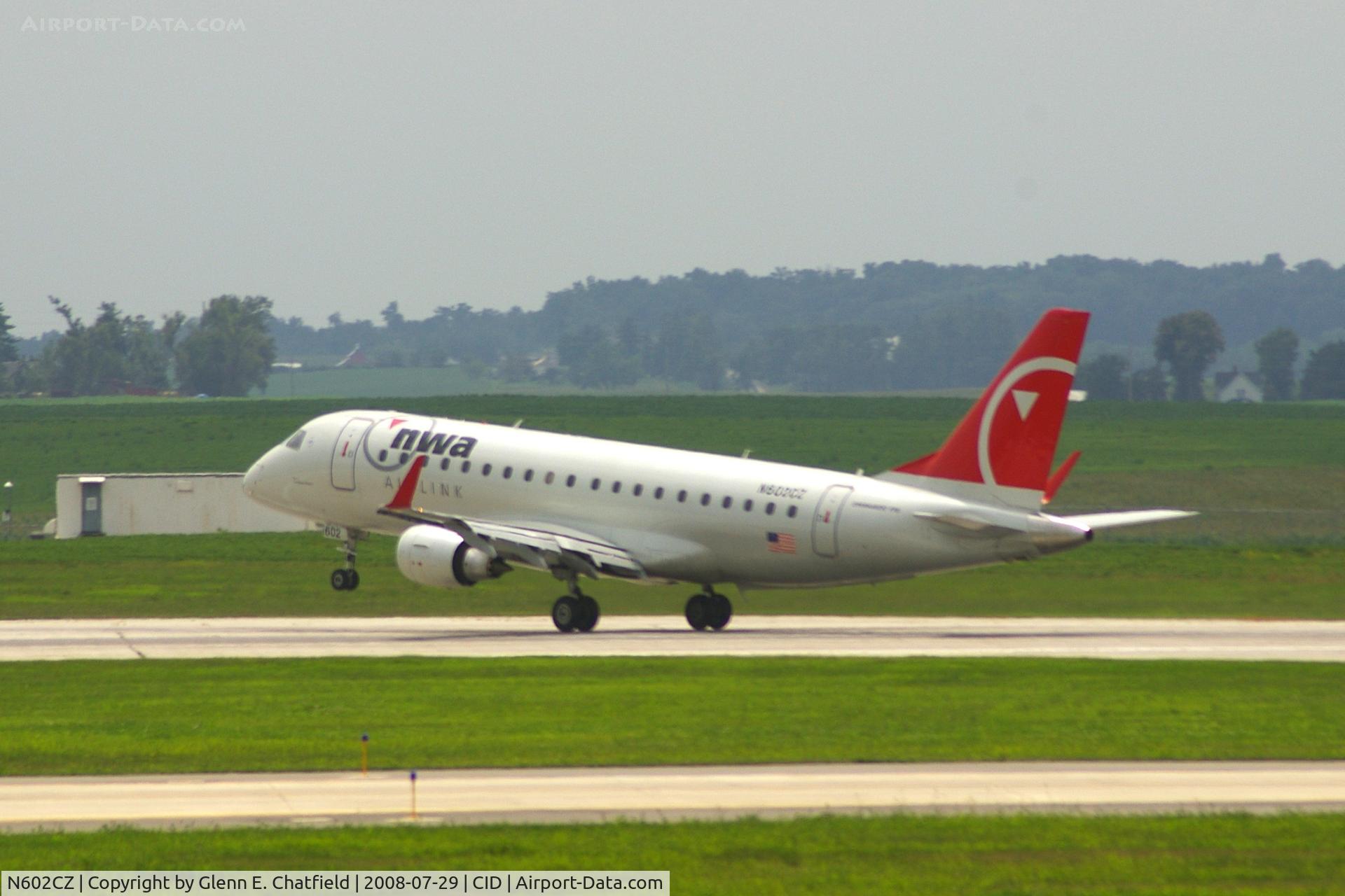 N602CZ, 2007 Embraer 175LR (ERJ-170-200LR) C/N 17000171, Rotating on Runway 13. Seen from second floor window of the control tower.