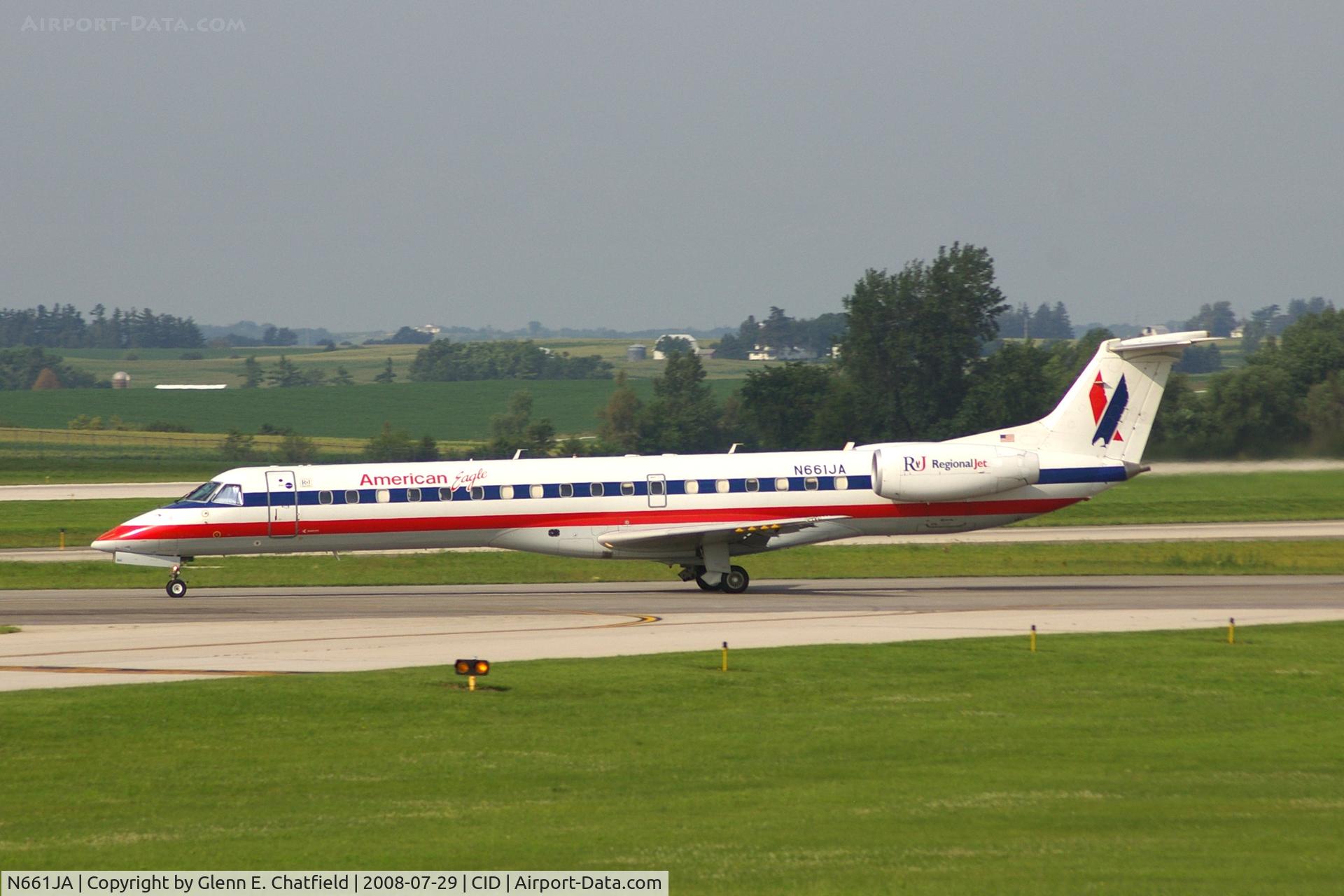 N661JA, 2003 Embraer ERJ-145LR (EMB-145LR) C/N 145766, Take-off roll on Runway 13. Seen from second floor window of the control tower.