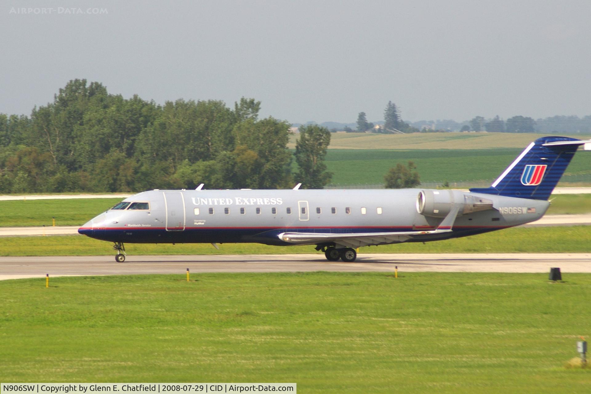 N906SW, 2001 Bombardier CRJ-200LR (CL-600-2B19) C/N 7510, Take-off roll on Runway 13. Seen from second floor window of the control tower.
