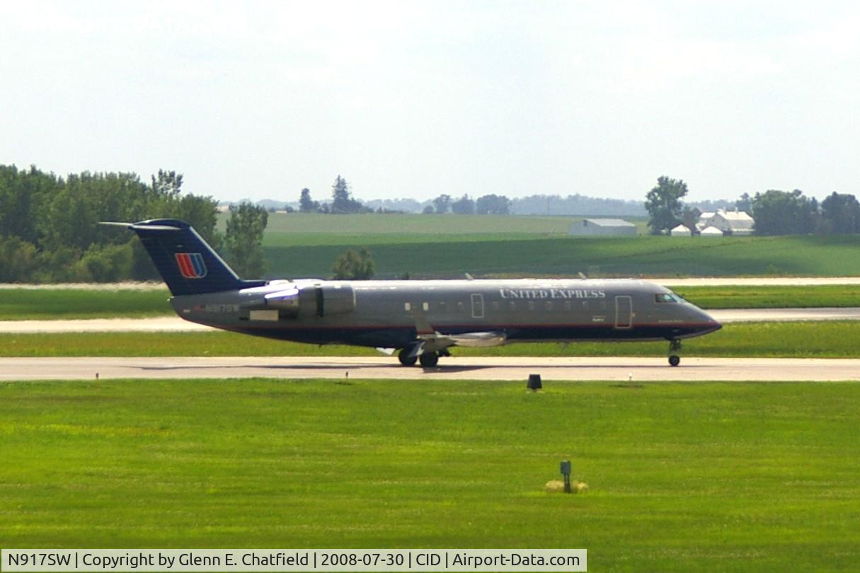 N917SW, 2002 Canadair CRJ-200LR (CL-600-2B19) C/N 7641, Rolling out on Runway 31, seen from my office window.