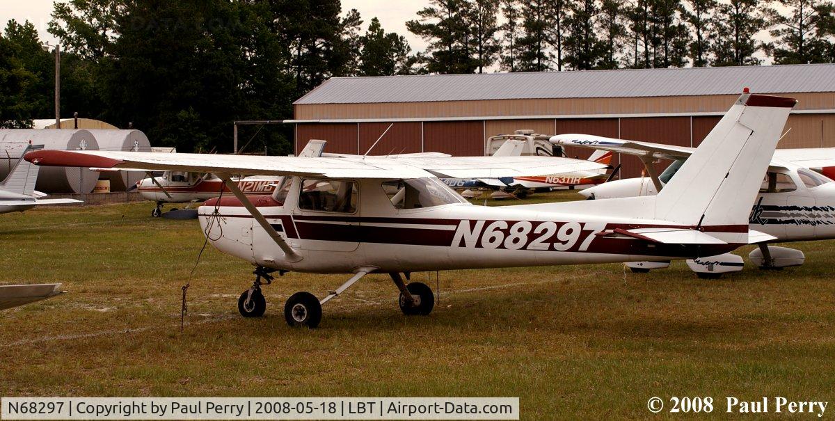 N68297, 1978 Cessna 152 C/N 15282236, Over with the main body of parked aircraft