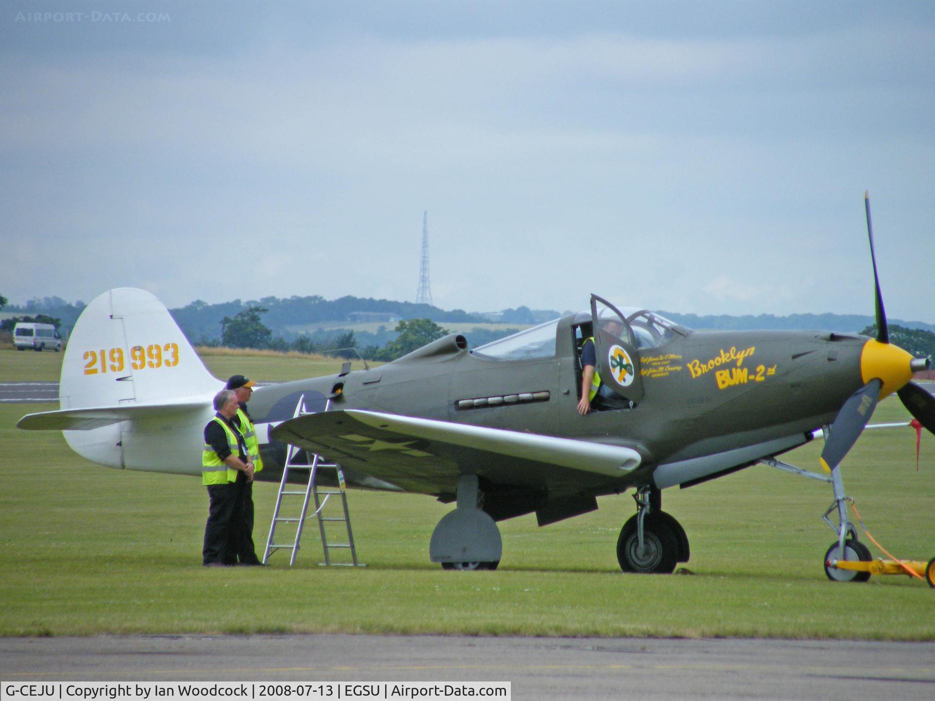 G-CEJU, Bell P-39Q Airacobra C/N 26E-397, Bell P-39Q6/Out on the grass at Duxford.