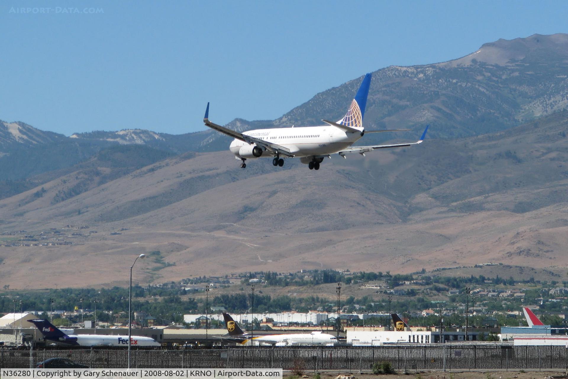 N36280, 2003 Boeing 737-824 C/N 31598, This Continental flight from Houston passes over the piano keys of runway 16R at Reno-Tahoe International.