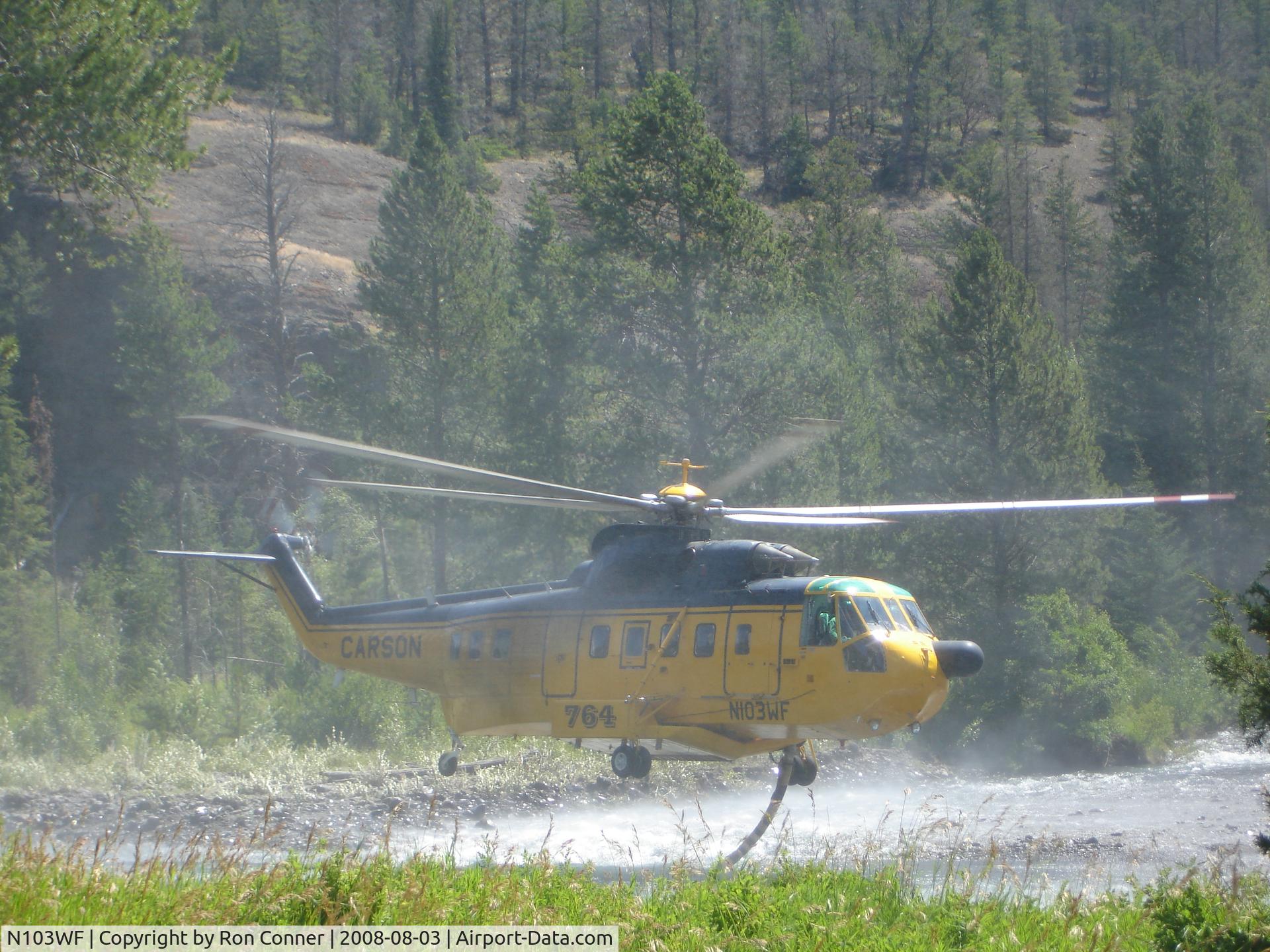 N103WF, 1977 Sikorsky S-61N C/N 61766, Taking on water from Shoshone River-fighting Gunbarrel Fire NW Wyoming