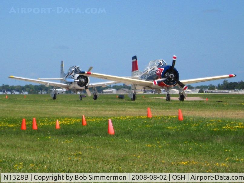 N1328B, 1955 North American T-28B Trojan C/N 200-425, N194RR bring up the rear at Airventure 2008 - Oshkosh, WI