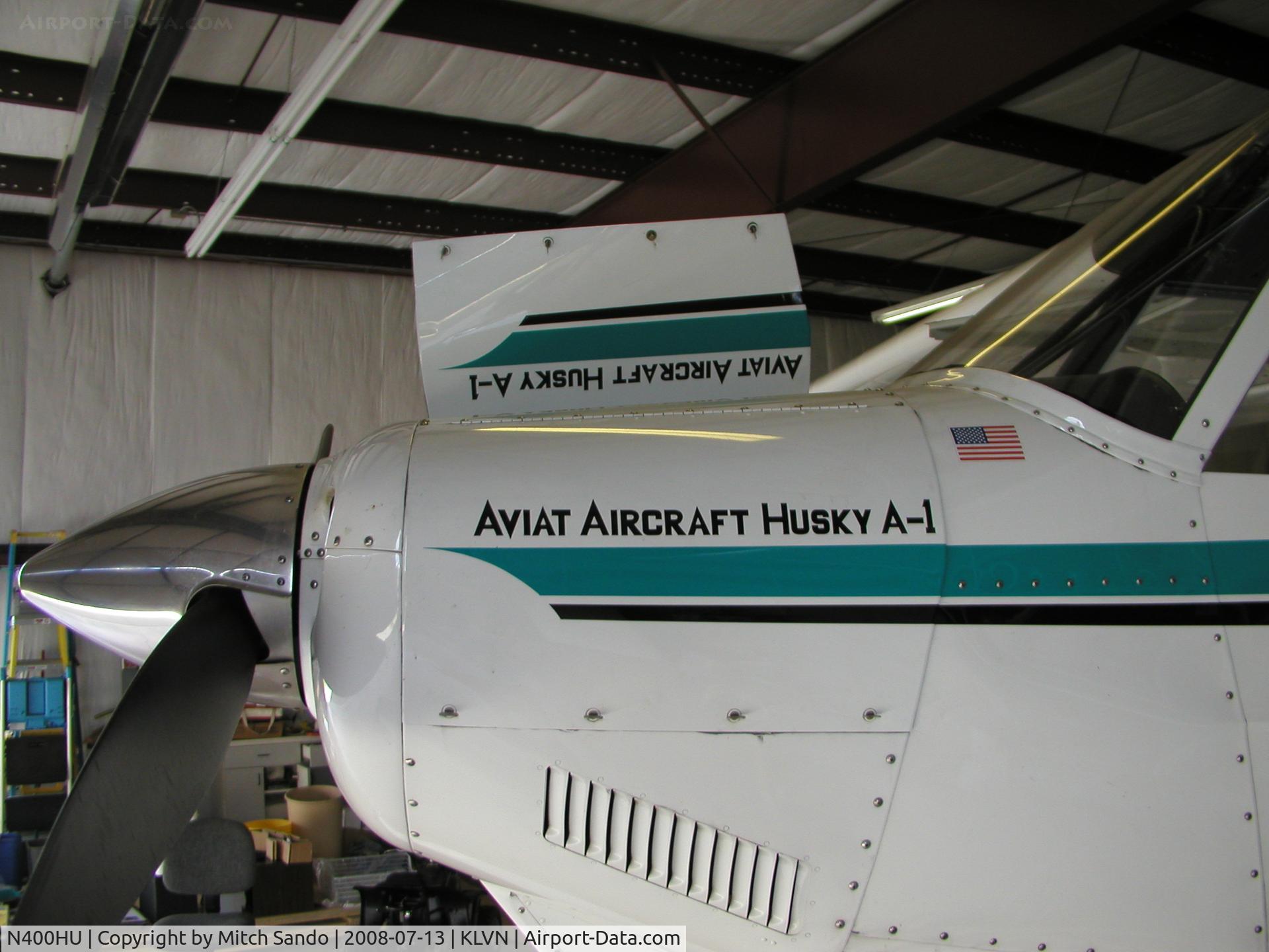 N400HU, 1997 Aviat A-1 Husky C/N 1346, Parked inside the hangar.