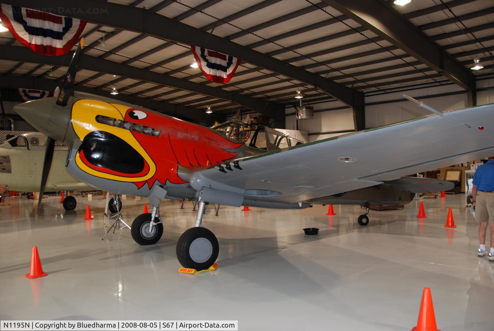 N1195N, 1942 Curtiss P-40N Warhawk C/N 130158, Parrot head P40 on display at Warhawk Air Museum.