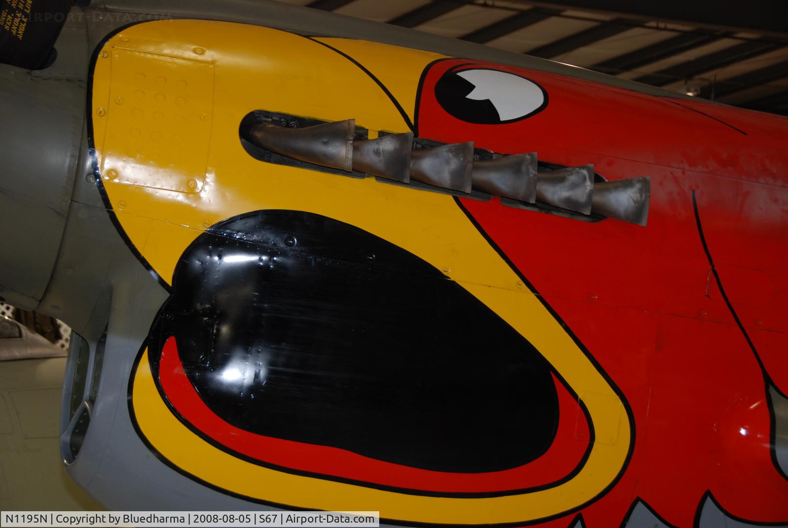 N1195N, 1942 Curtiss P-40N Warhawk C/N 130158, Parrot head P40 on display at Warhawk Air Museum.