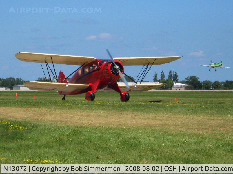 N13072, 1933 Waco UIC C/N 3724, That's N65MX departing RWY 36 in the background.  Airventure 2008 - Oshkosh, WI