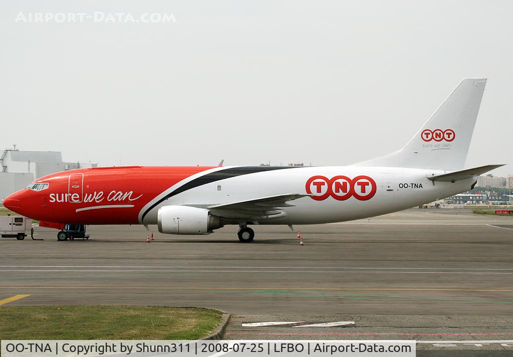 OO-TNA, 1986 Boeing 737-3T0F C/N 23569, On Cargo ramp shoot with 'Sure we can' titles...