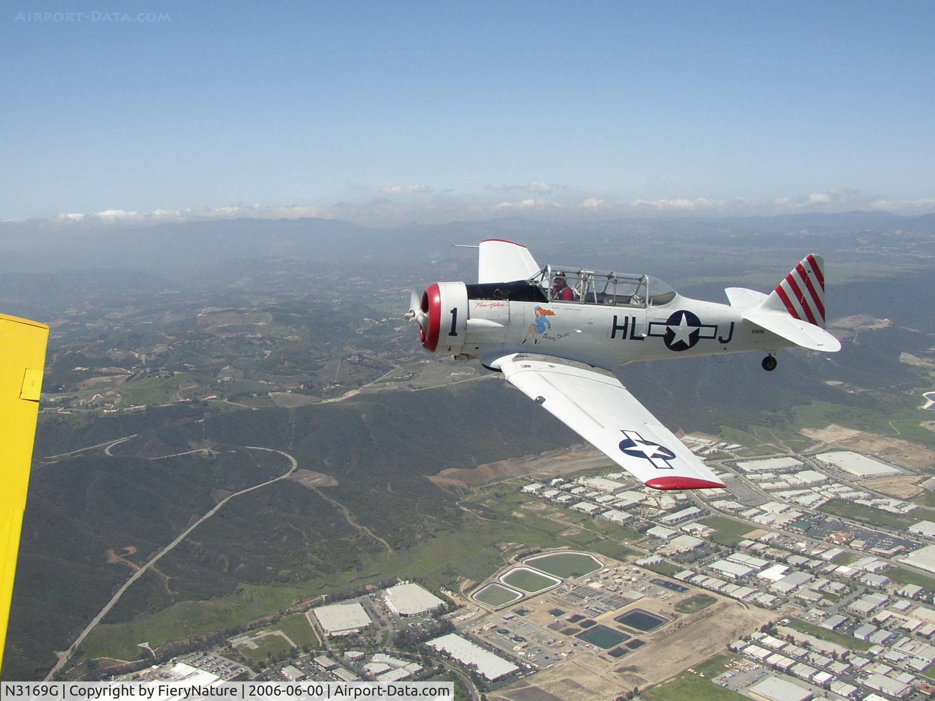 N3169G, 1945 North American AT-6F Texan C/N 121-42937, Formation flight to Wings over Gillespie.
