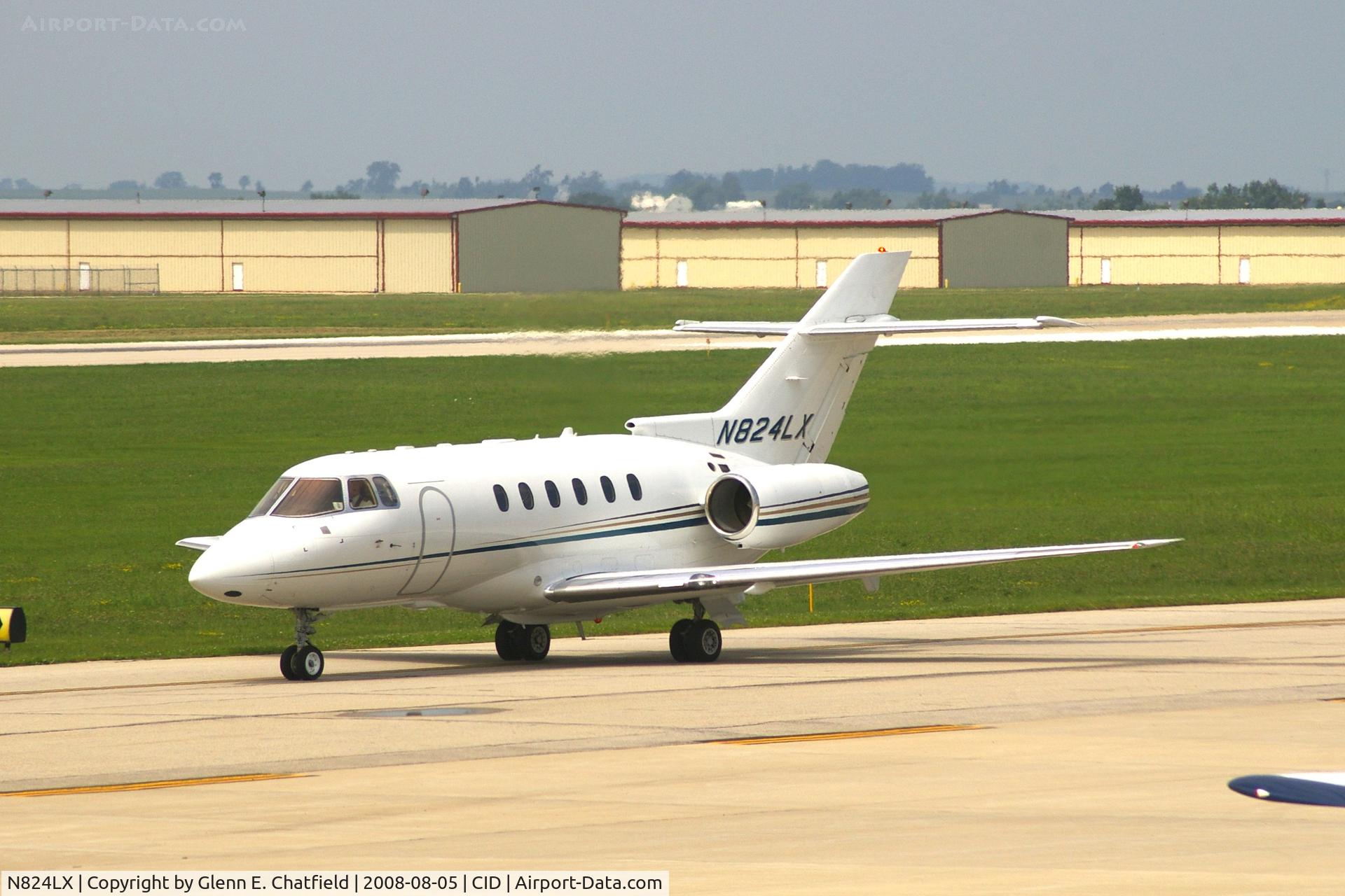 N824LX, 2005 Raytheon Hawker 800XP C/N 258740, Seen from my office window, taxiing out to runway 27