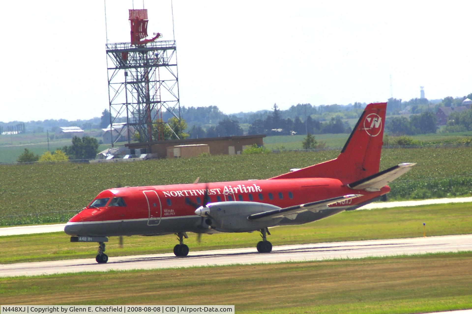 N448XJ, 1998 Saab 340B C/N 340B-448, Taxiing on Alpha to the ramp.  Looking through my dirty window.