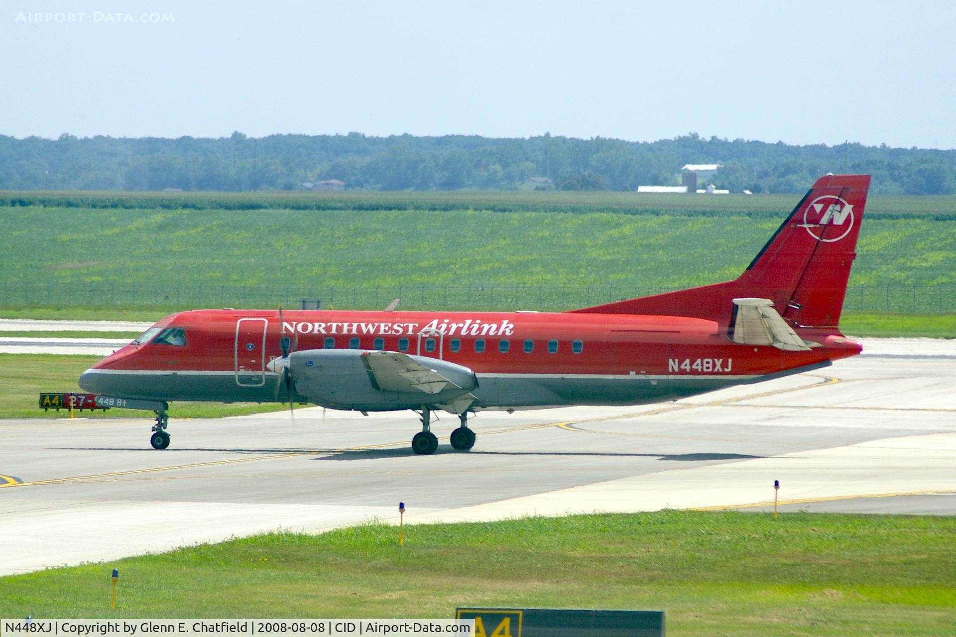 N448XJ, 1998 Saab 340B C/N 340B-448, Taxiing on Alpha to the ramp.  Looking through my dirty window.
