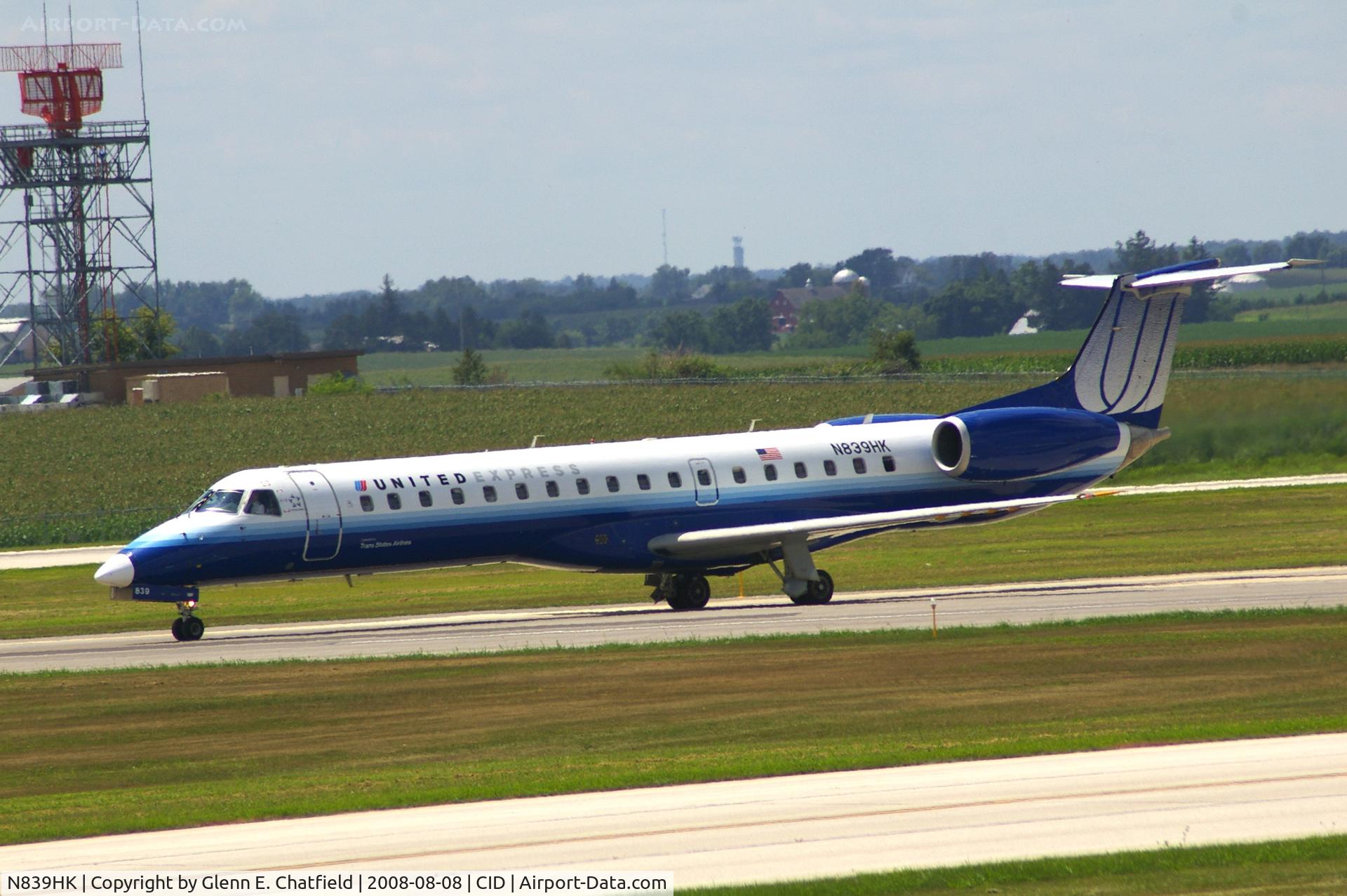 N839HK, 2004 Embraer ERJ-145LR (EMB-145LR) C/N 14500829, Taxiing on Alpha to the ramp.  Looking through my dirty window.