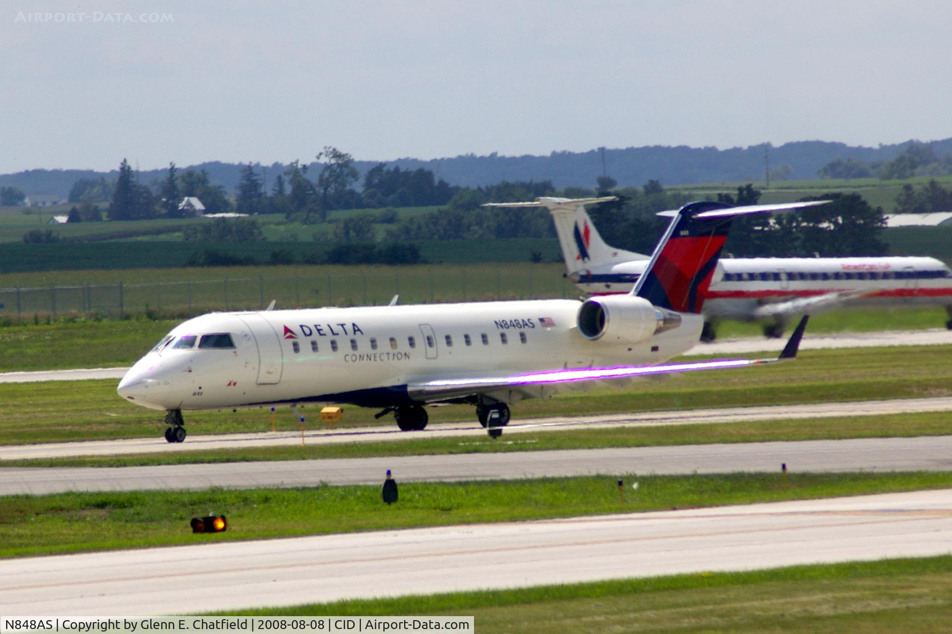 N848AS, 1999 Bombardier CRJ-200ER (CL-600-2B19) C/N 7339, Taxiing on Alpha to the ramp.  Looking through my dirty window.