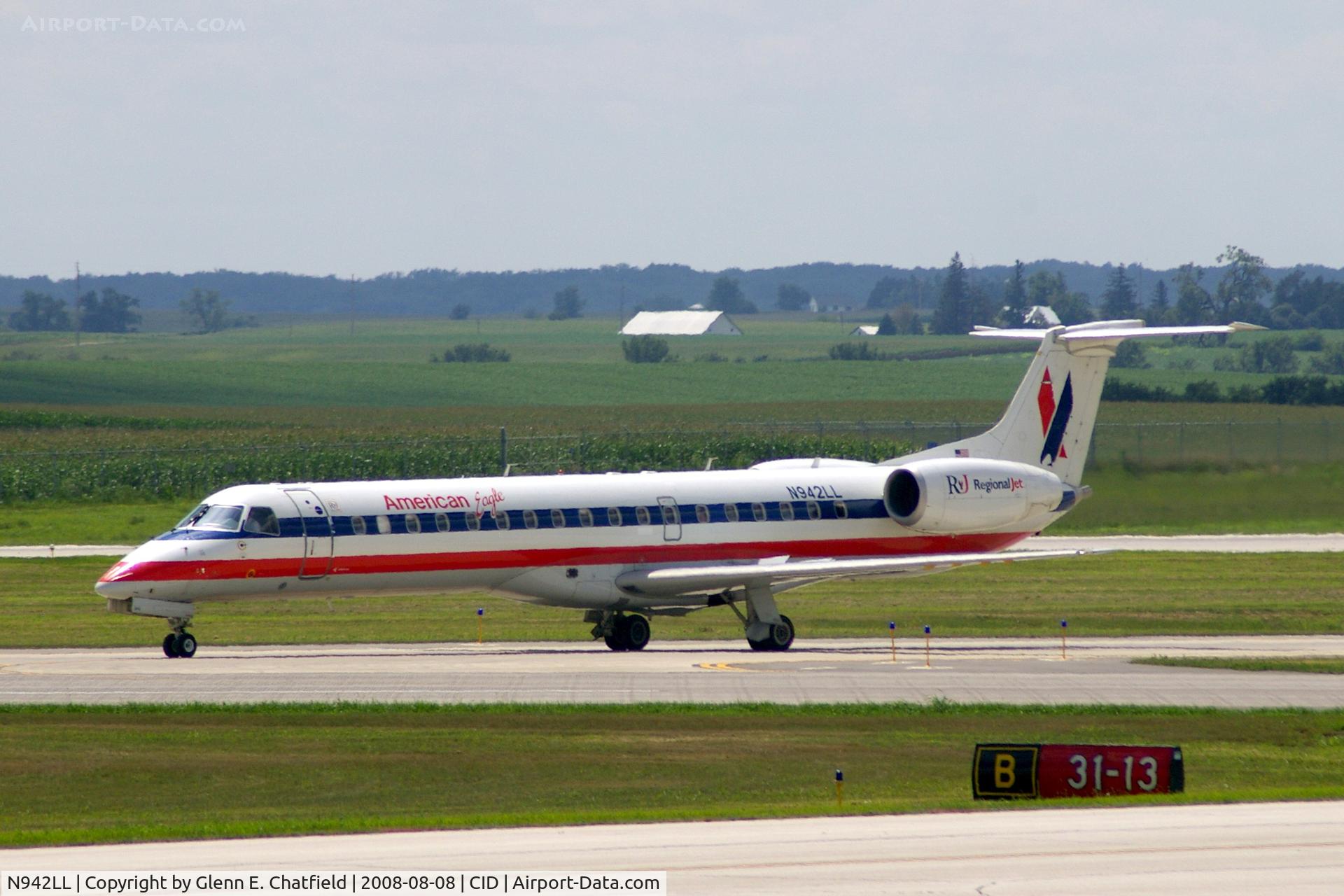 N942LL, 2005 Embraer ERJ-145LR (EMB-145LR) C/N 14500930, Taxiing on Alpha to the ramp.  Looking through my dirty window.