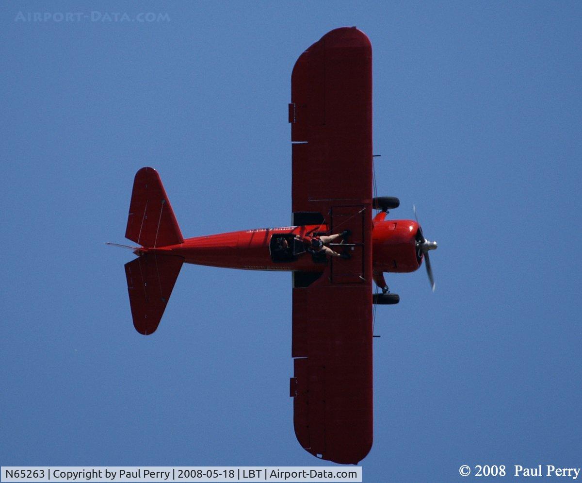 N65263, 1940 Boeing B75N1 C/N 75-3447, 90 Degrees of bank holding Carol on the wing